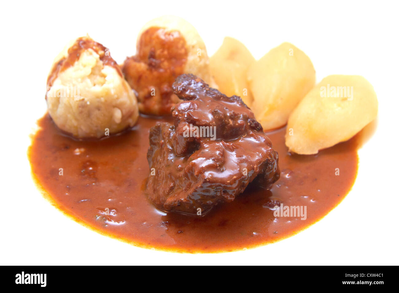 La carne di cervo con il piccante pere in camicia e pane dumbling Foto Stock