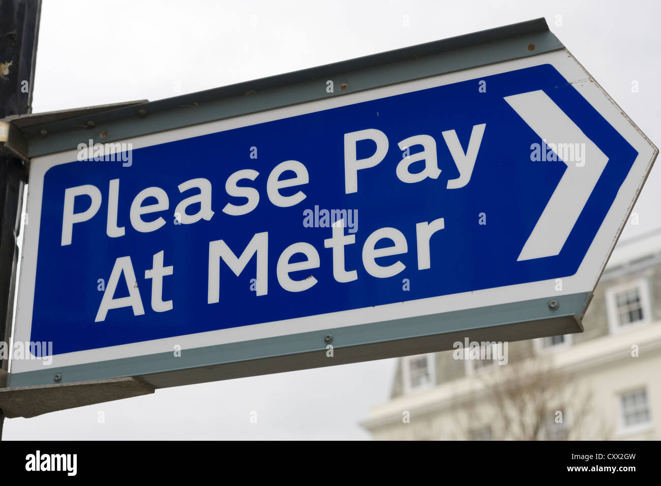 Si prega di pagare in segno del misuratore in un parcheggio, pagare qui, REGNO UNITO Foto Stock