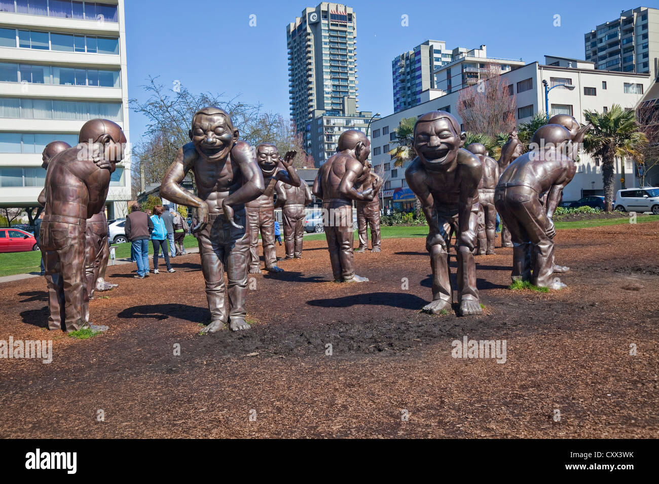"Incredibile risate' sculture dell'artista Yue Minjun, in Vancouver, Colombia britannica, Canada. Foto Stock