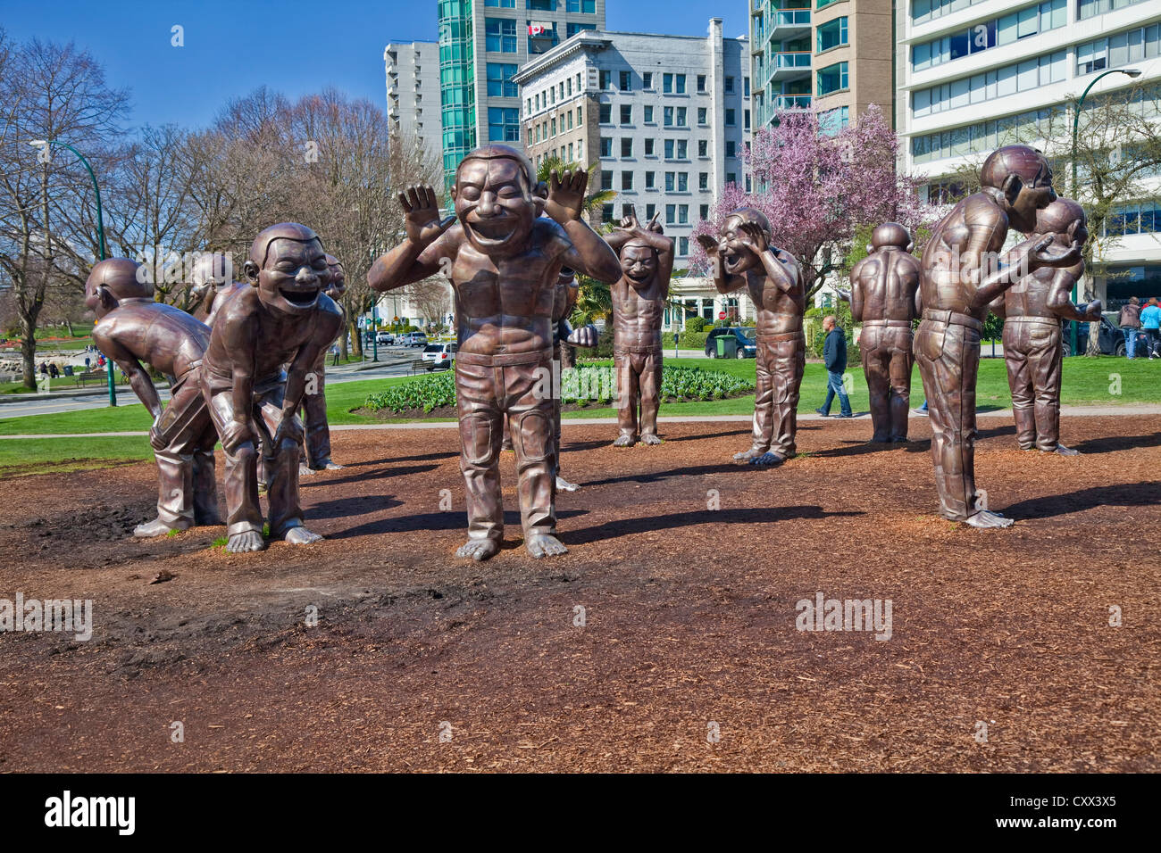 "Incredibile risate' sculture dell'artista Yue Minjun, in Vancouver, Colombia britannica, Canada. Foto Stock