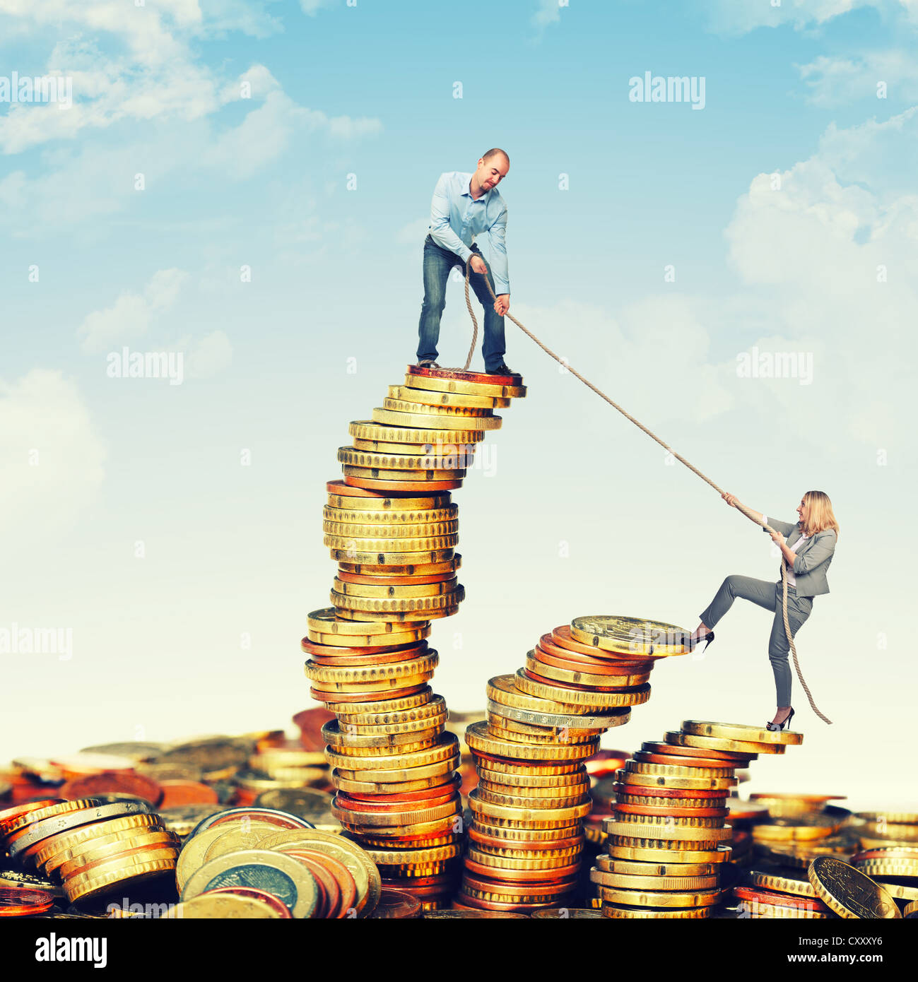 Il team di business su euro moneta pile Foto Stock