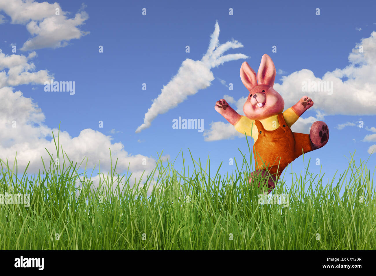 Bunny per raggiungere una nuvola conformata come una carota, illustrazione Foto Stock