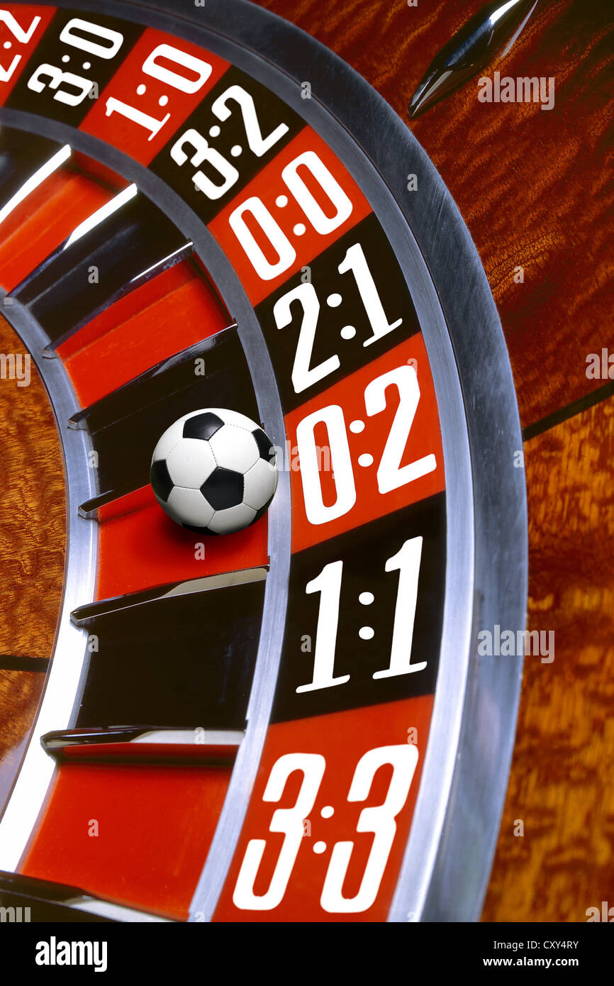 Roulette con un calcio, cliente 0-2, immagine simbolica per scommesse sportive Foto Stock