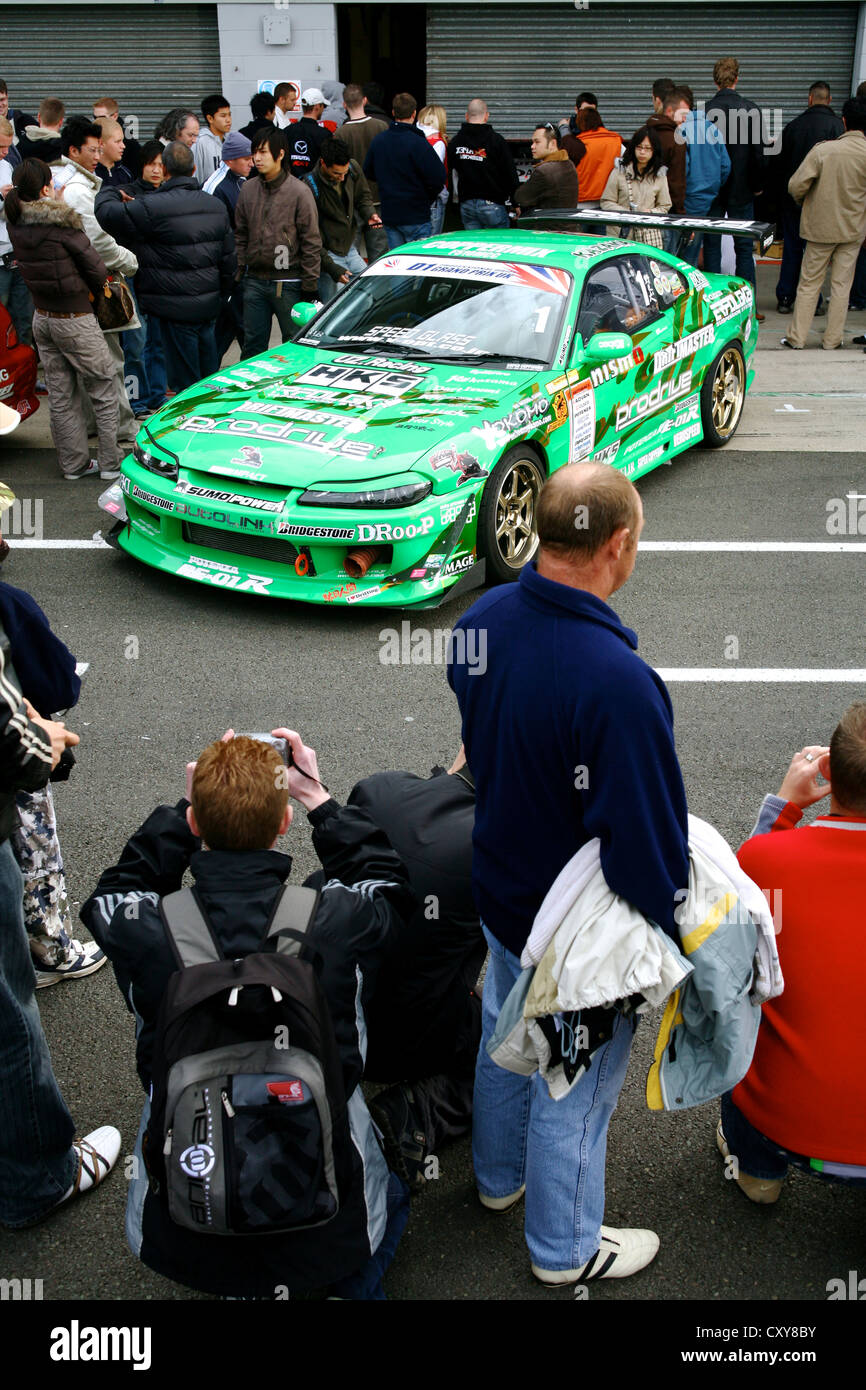 Auto deriva sul display in pit-lane Foto Stock