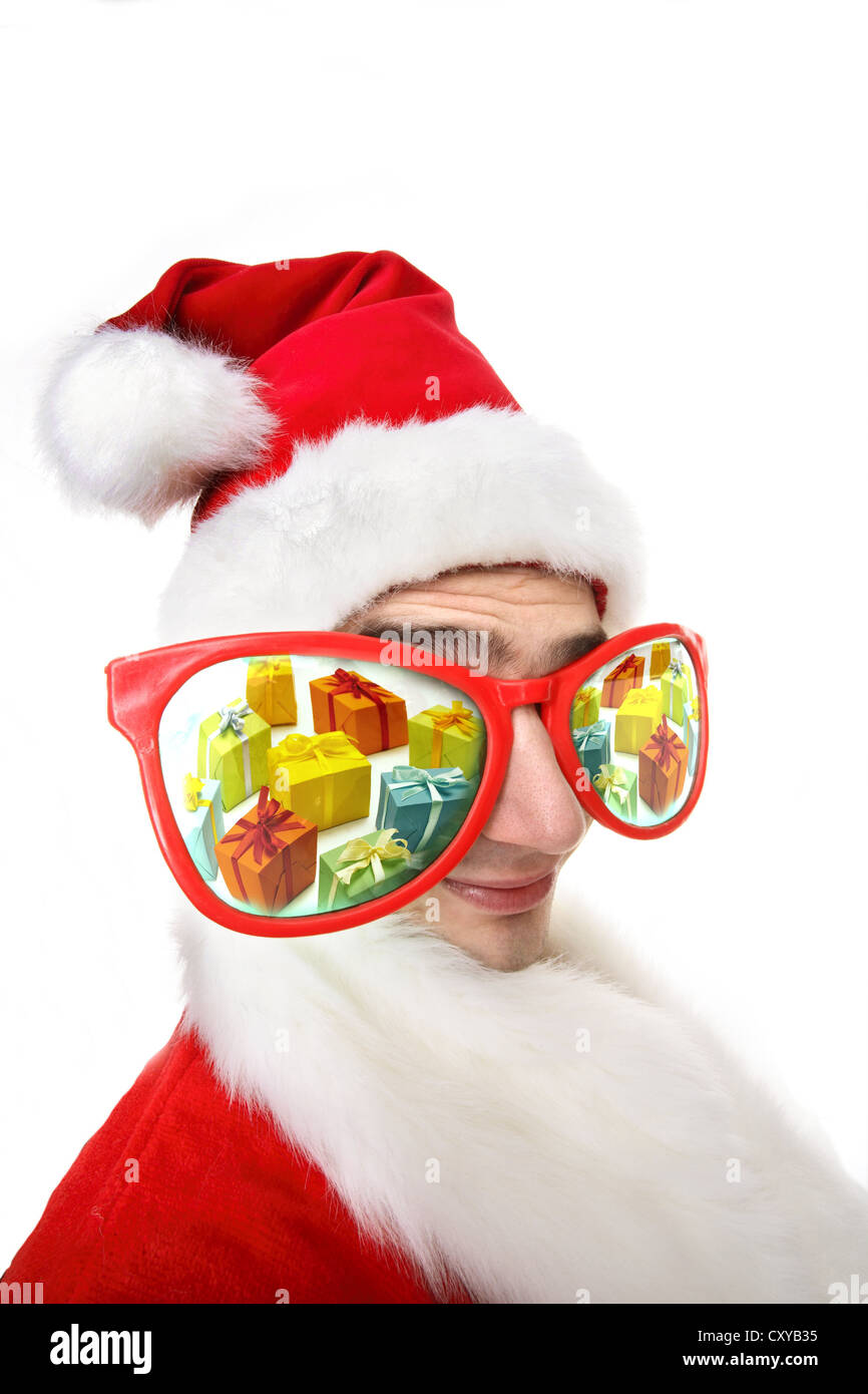 Uomo vestito da Santa Claus indossando grandi novità bicchieri Foto Stock