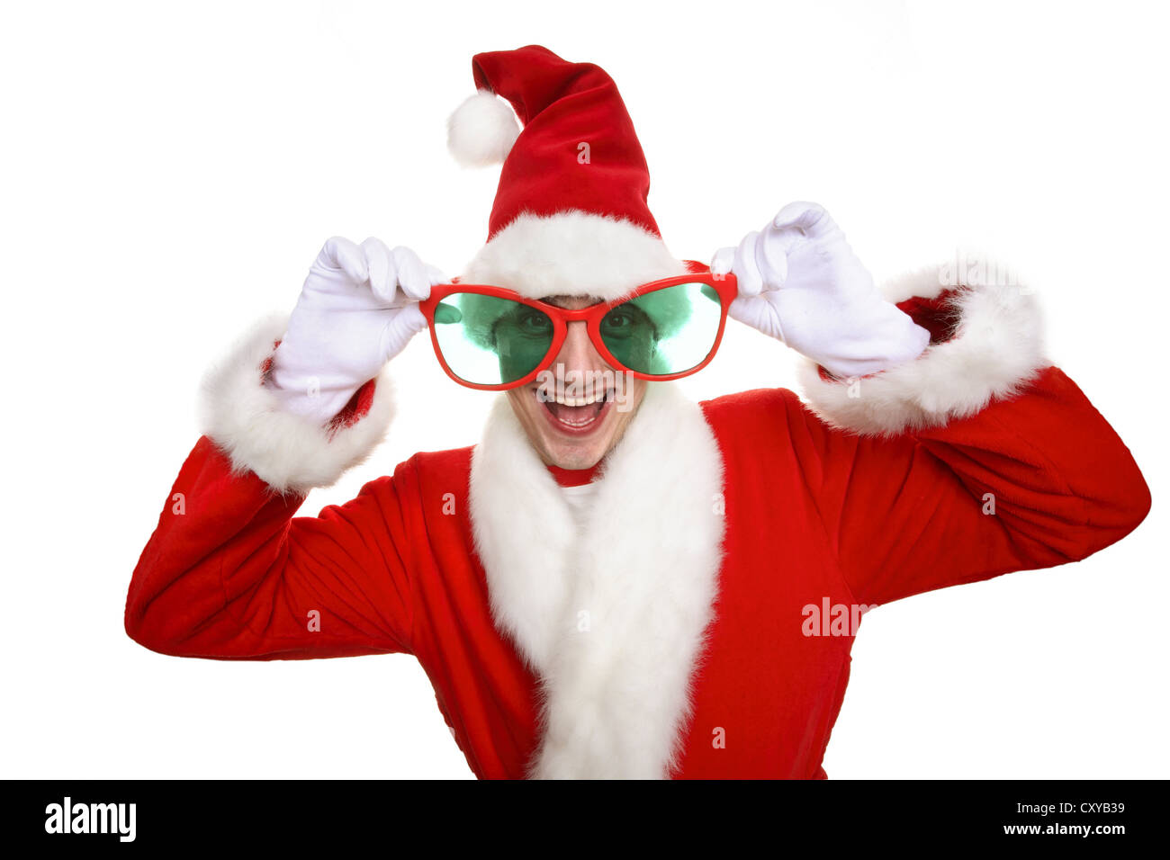 Uomo sorridente vestiti da Babbo Natale che indossa grandi novità bicchieri Foto Stock