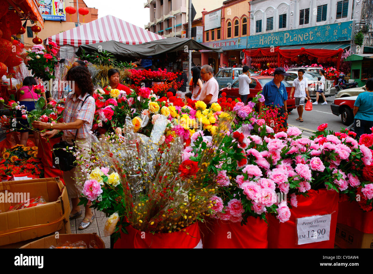 Pressione di stallo di fiori, i preparativi per il nuovo anno cinese festival, Chinatown, Kuala Lumpur, Malesia, Asia sud-orientale, Asia Foto Stock