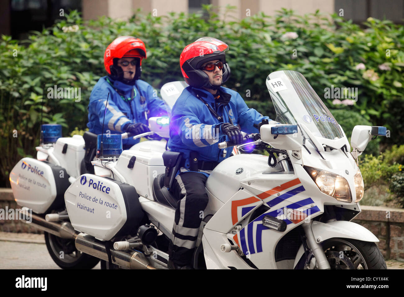 La polizia belga motociclo accompagnatrici Foto Stock