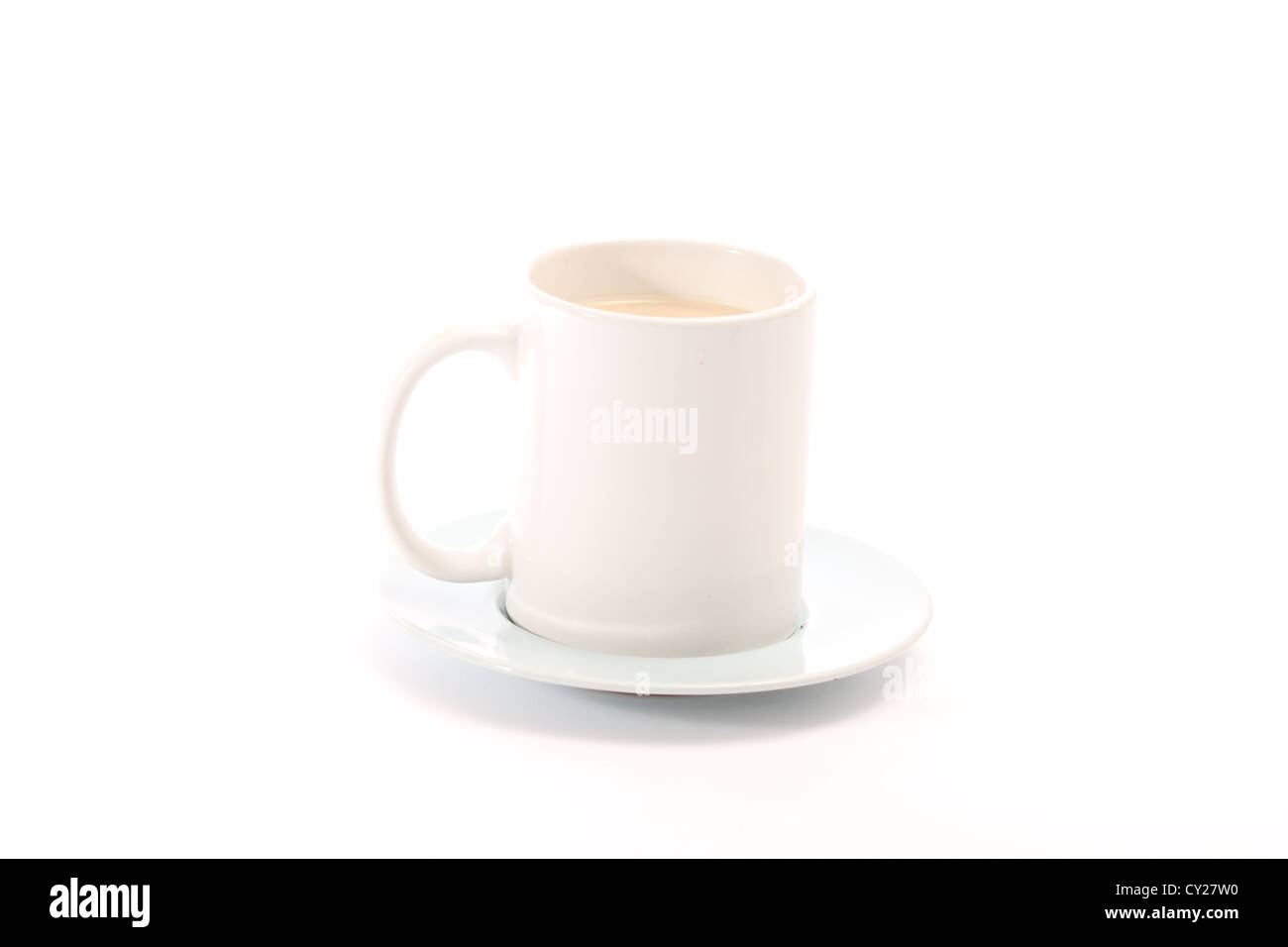 Mup di tè con piattino contro uno sfondo chiaro studio shot, photoarkive Foto Stock