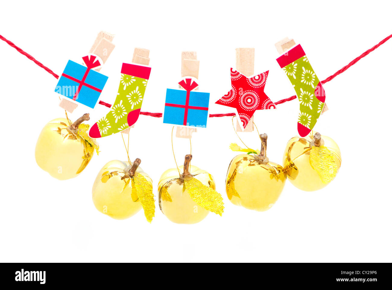 Decorazioni di Natale - mela golden appeso a una fila Foto Stock