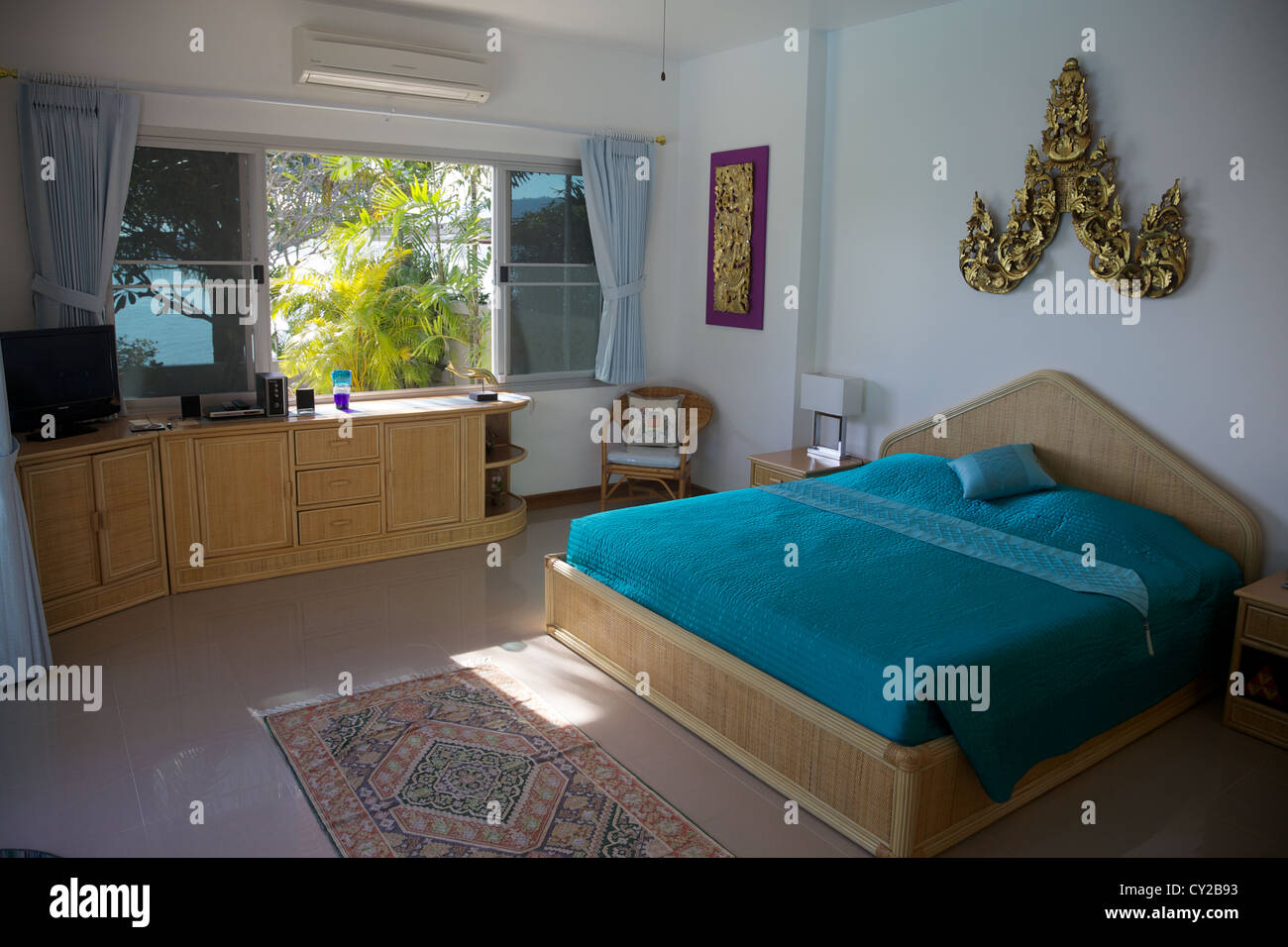 Una moderna camera da letto in un beachhouse in Phuket, Tailandia Foto Stock