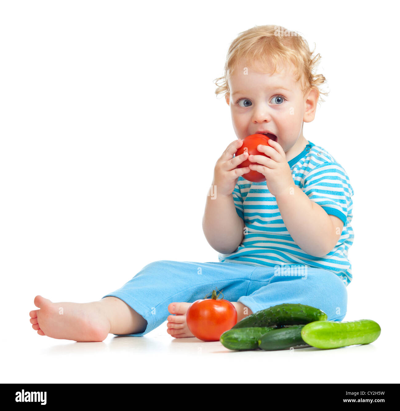 Bambino mangiare cibo sano isolato Foto Stock