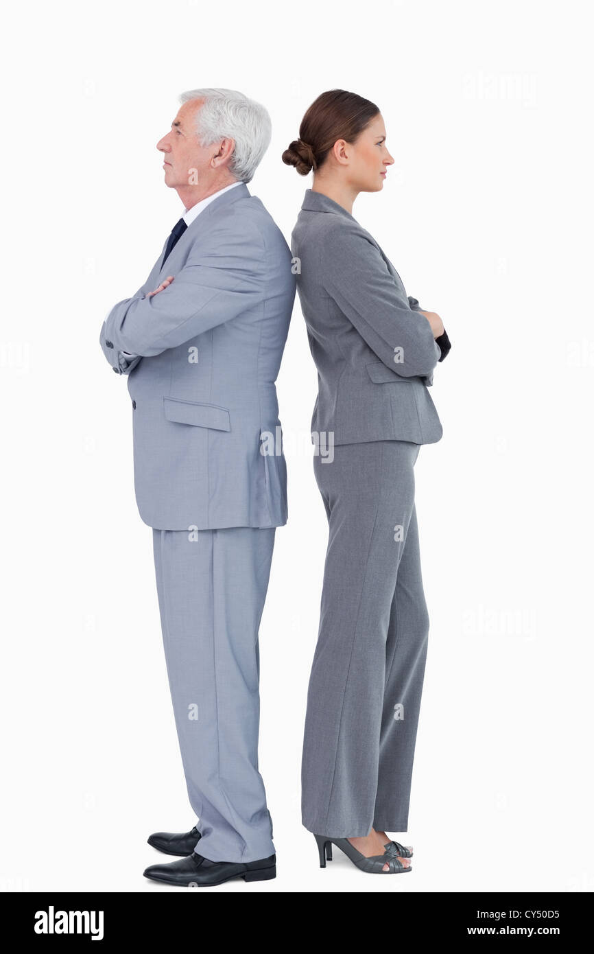 Businesspartner standing back to back Foto Stock