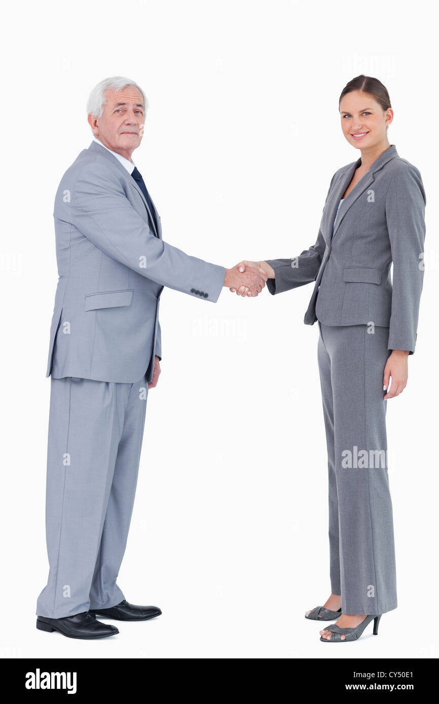 Imprenditore e la donna si stringono la mano Foto Stock