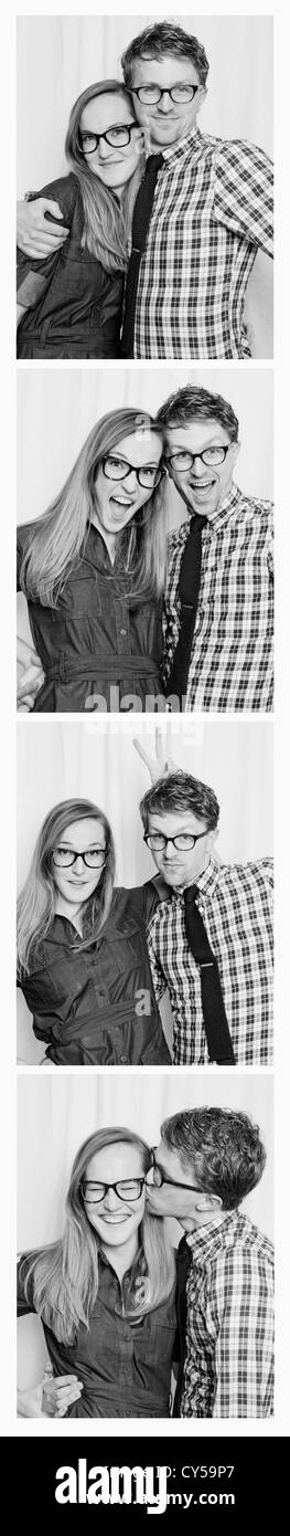 Matura in Photo Booth Foto Stock
