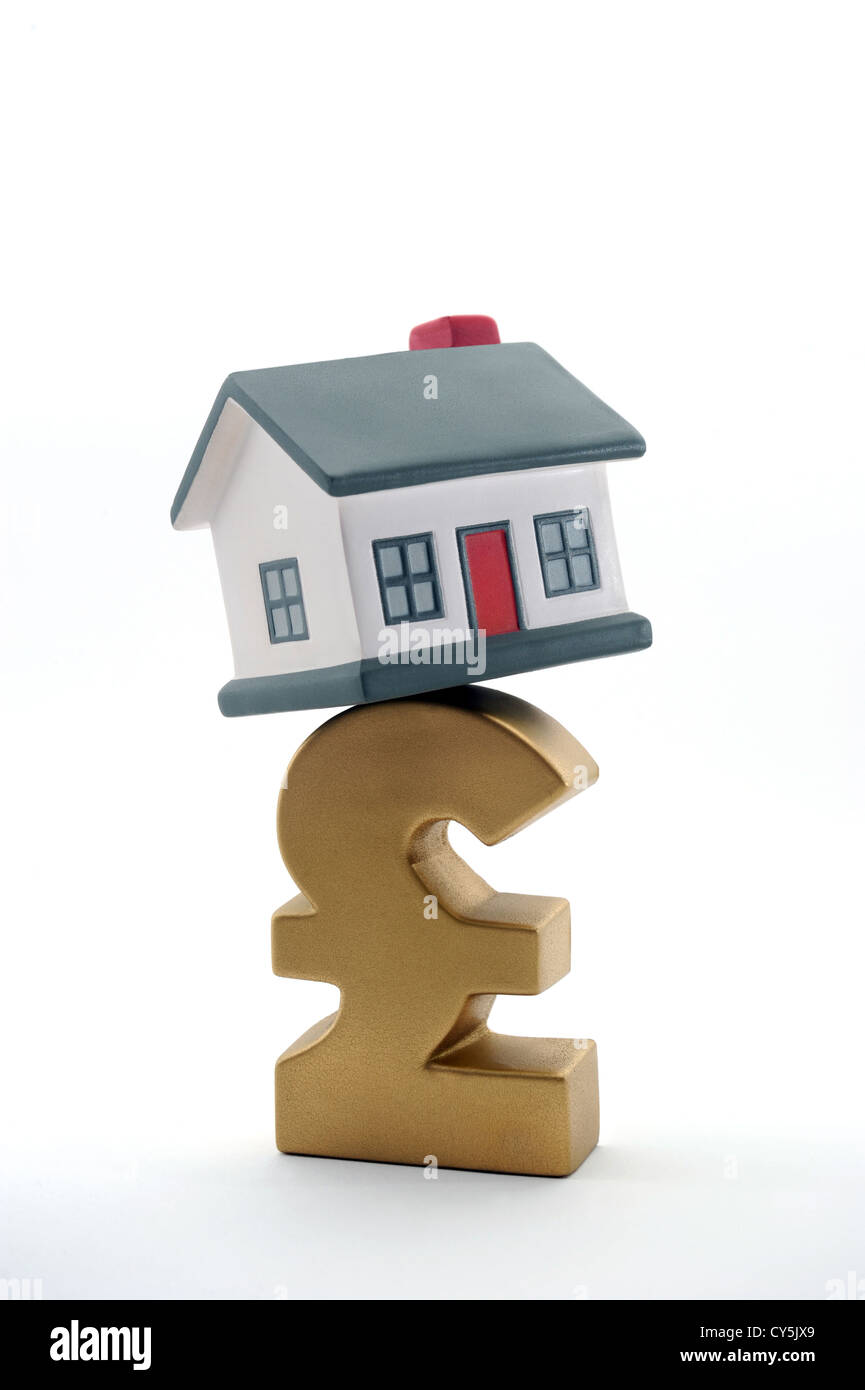 Casa in equilibrio su British pound firmare nuovamente i tassi di interesse ipoteche redditi salari costi di gestione fatture denaro in contante gli acquirenti di case REGNO UNITO Foto Stock