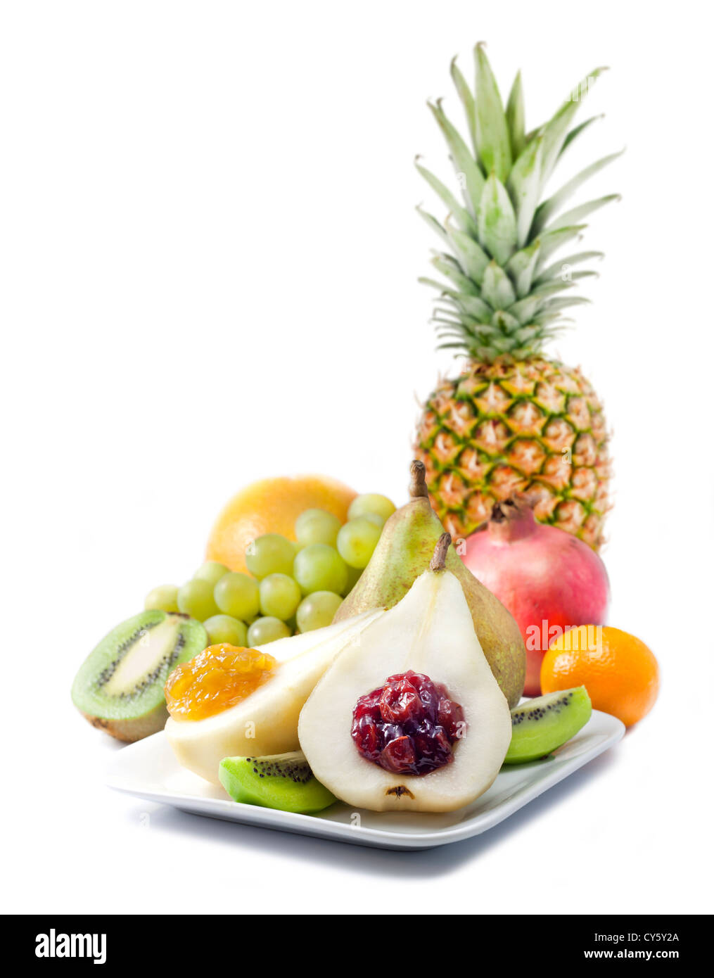 La frutta e le pere con marmellata closeup cibo di lusso concetto su bianco Foto Stock