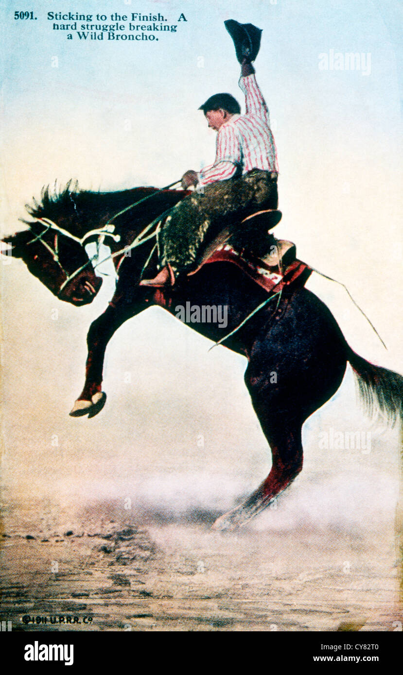 Cowboy a cavallo selvaggio Bronco, Hand-Colored fotografia, circa 1911 Foto Stock