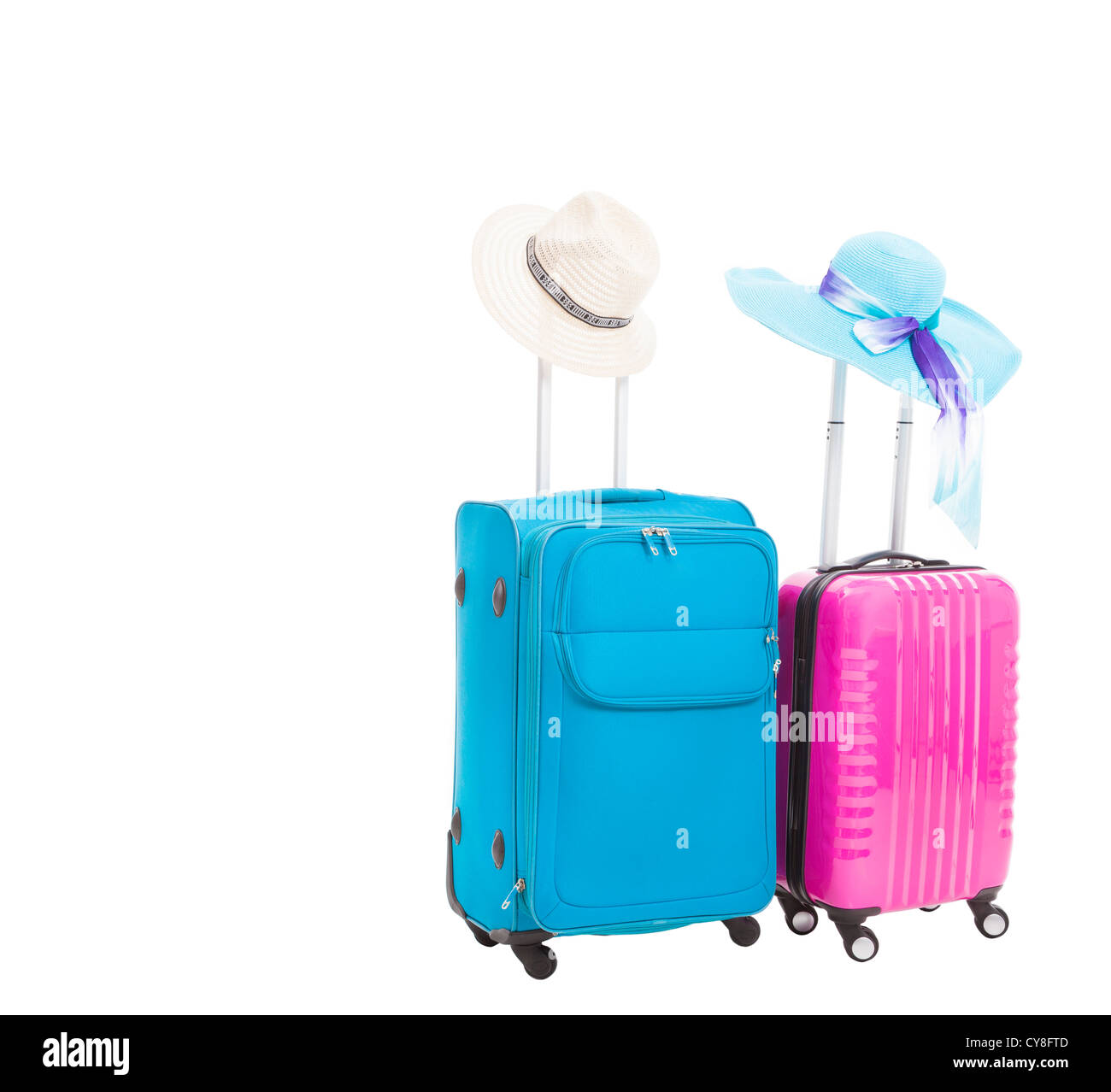 Due custodia da viaggio con cappelli isolato su bianco Foto Stock