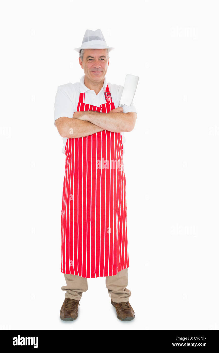 Butcher nel grembiule con carne cleaver Foto Stock