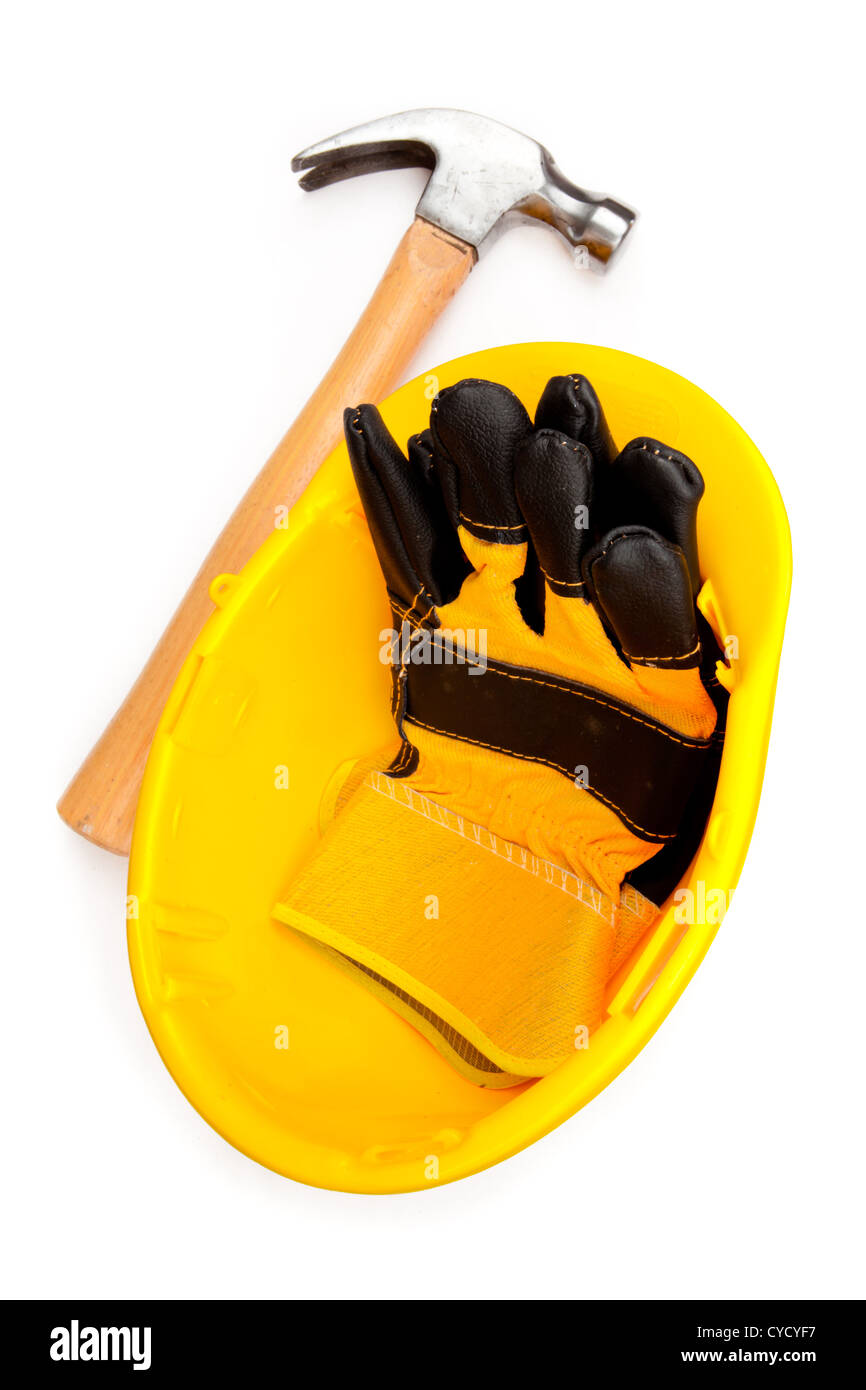 Due guanti in pelle in un casco con un martello Foto Stock Due guanti in pelle in un casco con un martello Foto Stock