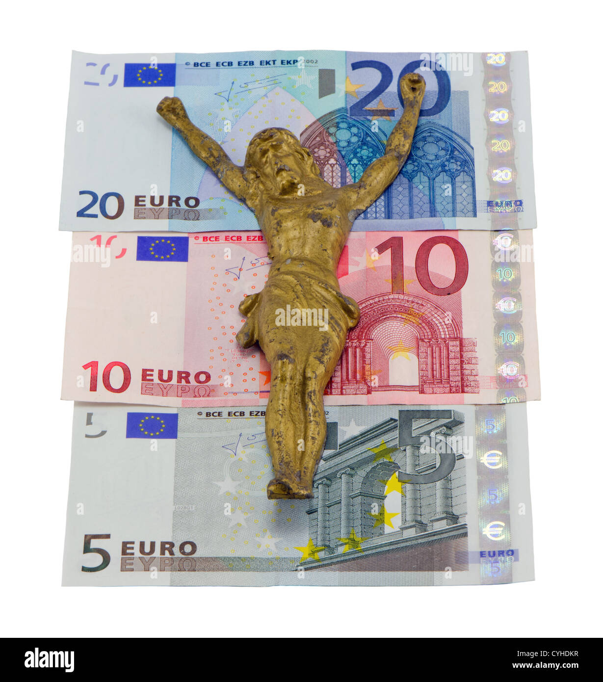Oro crocifiggere Gesù sulle banconote in euro isolato su bianco. Concetto di Europa crisi finanziaria. Cinque dieci e venti banconote in euro. Foto Stock