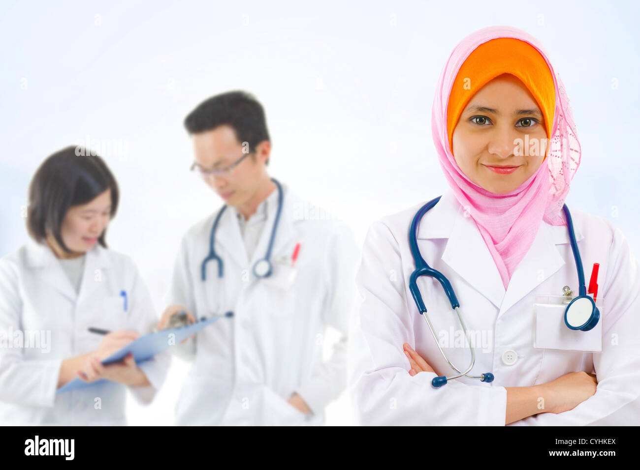 Il team medico in diverse gare indoor permanente Foto Stock
