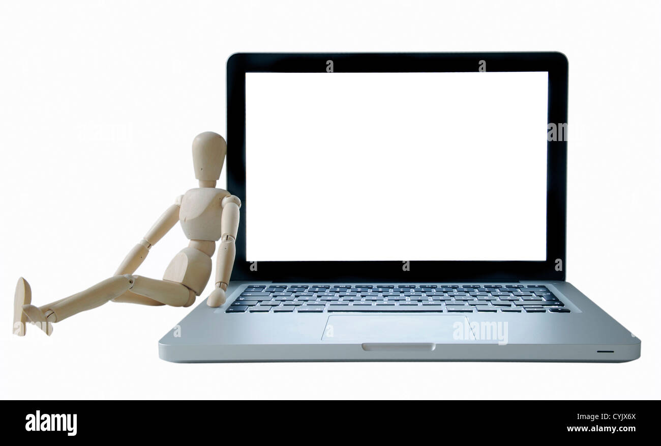 Computer portatile con uomo di legno facendo una pausa. Foto Stock