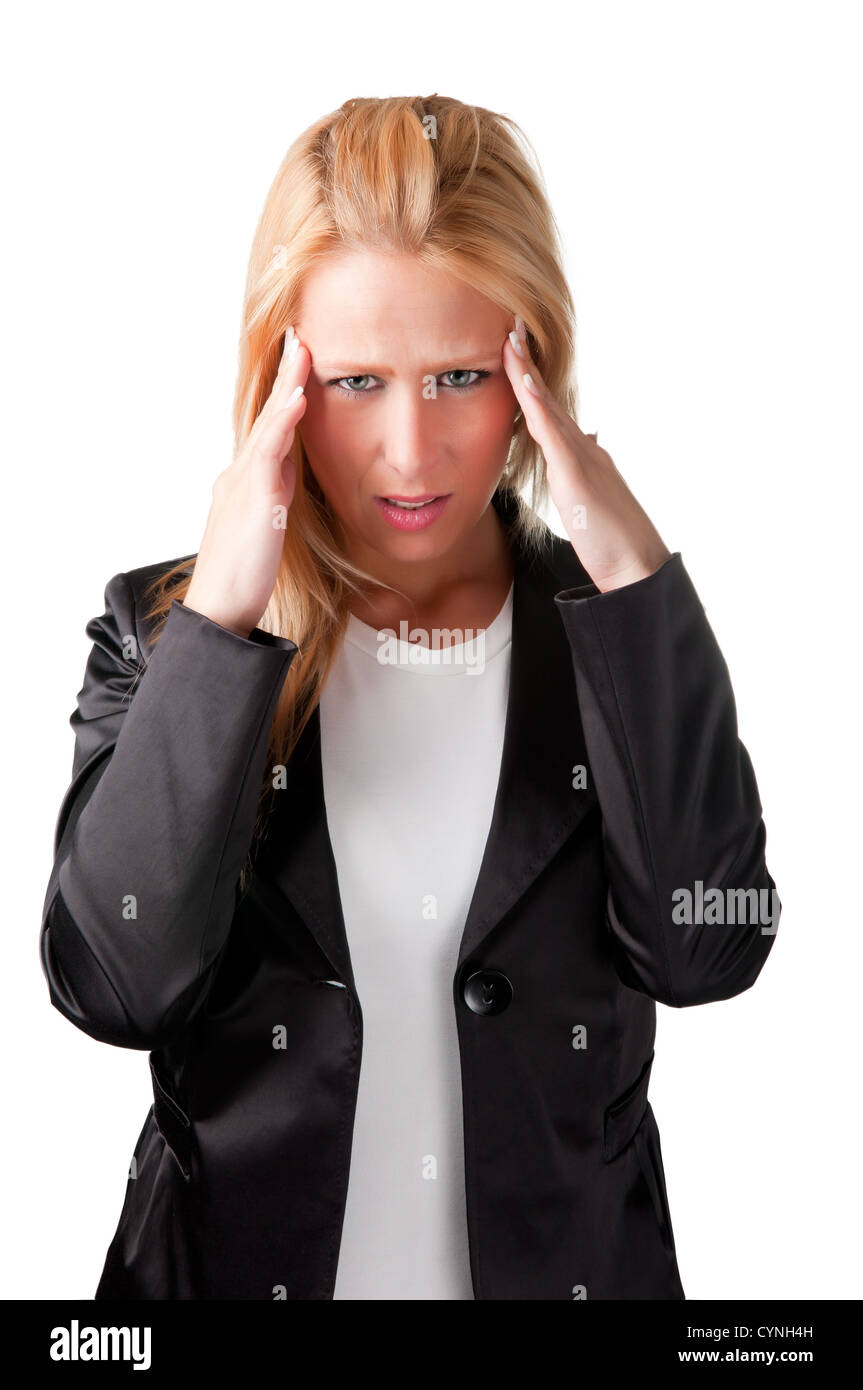 La donna che soffre di un mal di testa, tenendo le mani alla testa Foto Stock