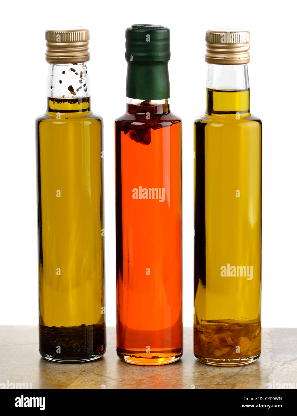 La cottura di bottiglie di olio con erbe e spezie Foto Stock