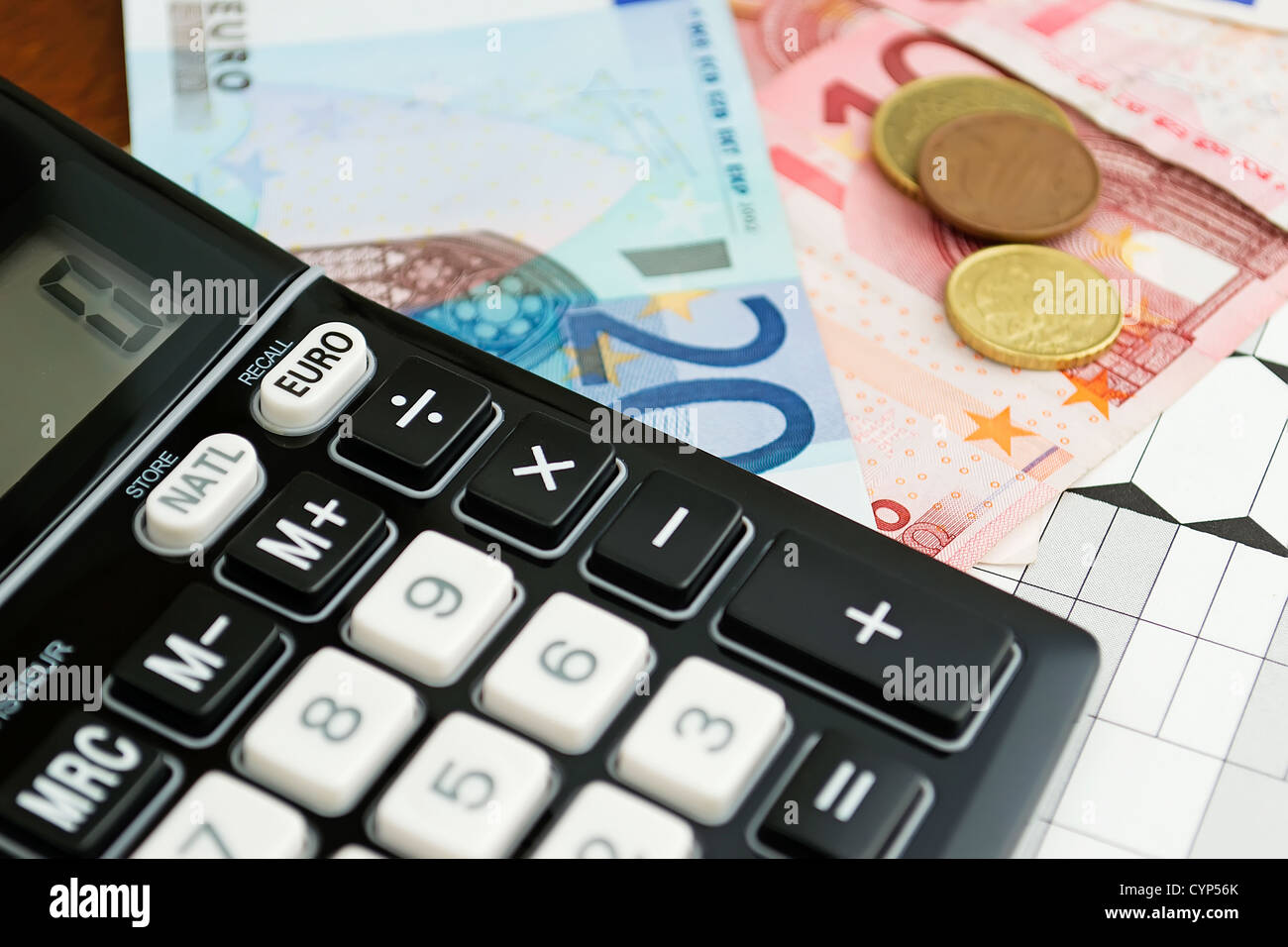 Calcolatrice e denaro Foto Stock