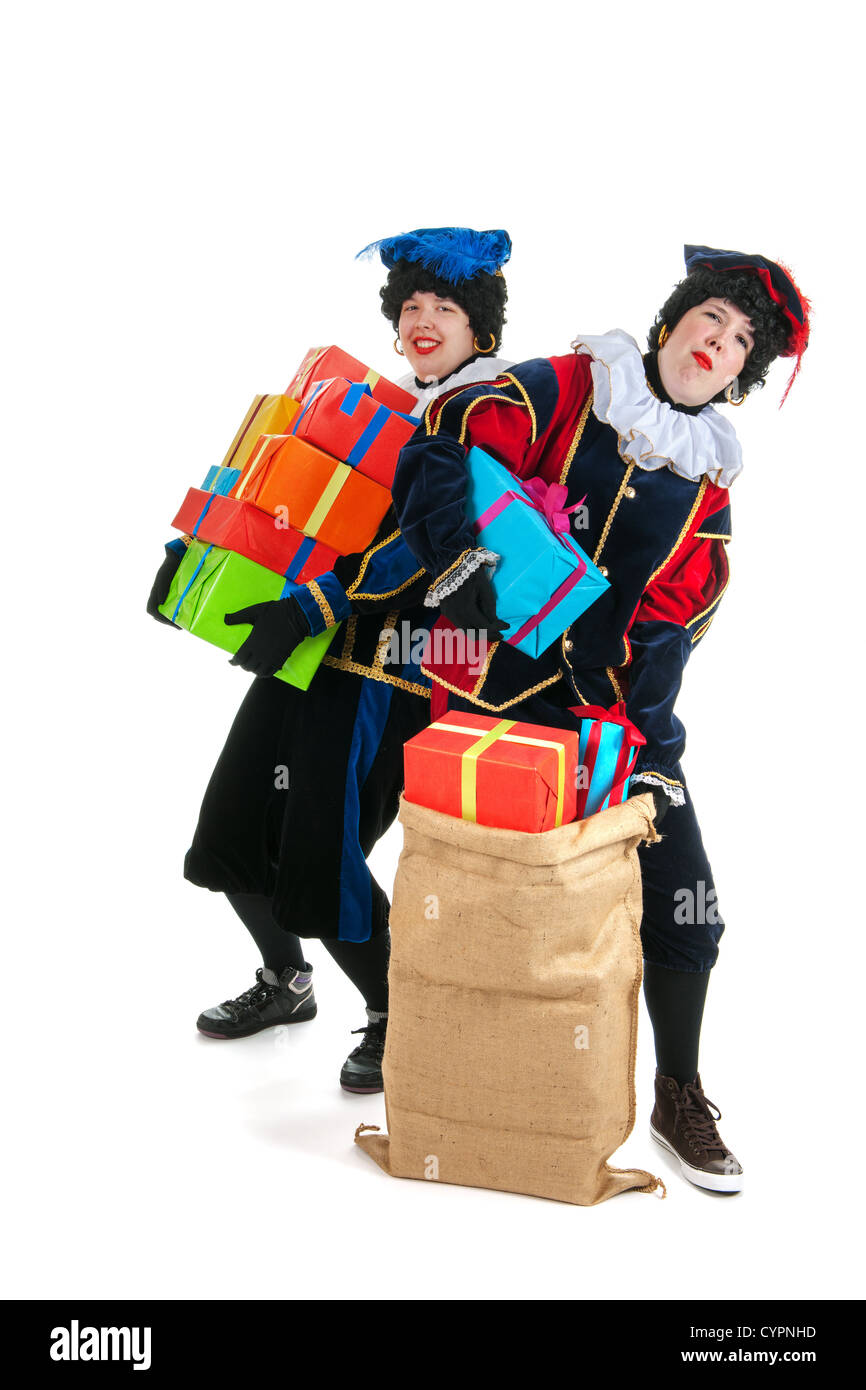 Caratteri olandese come bianco petes per tipiche Sinterklaas vacanze con sacchi di iuta Foto Stock