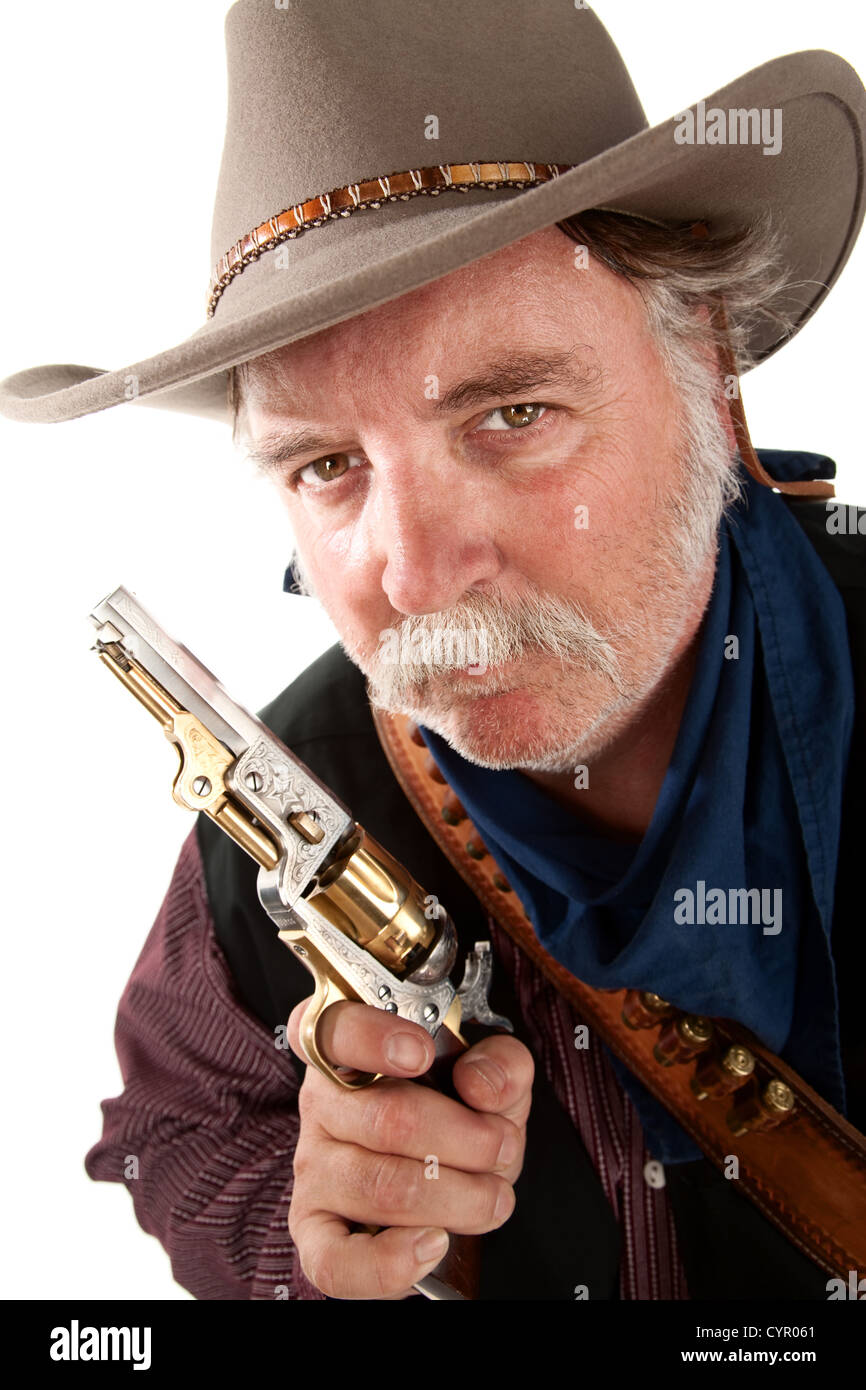 Cowboy su sfondo bianco con pistola Foto Stock