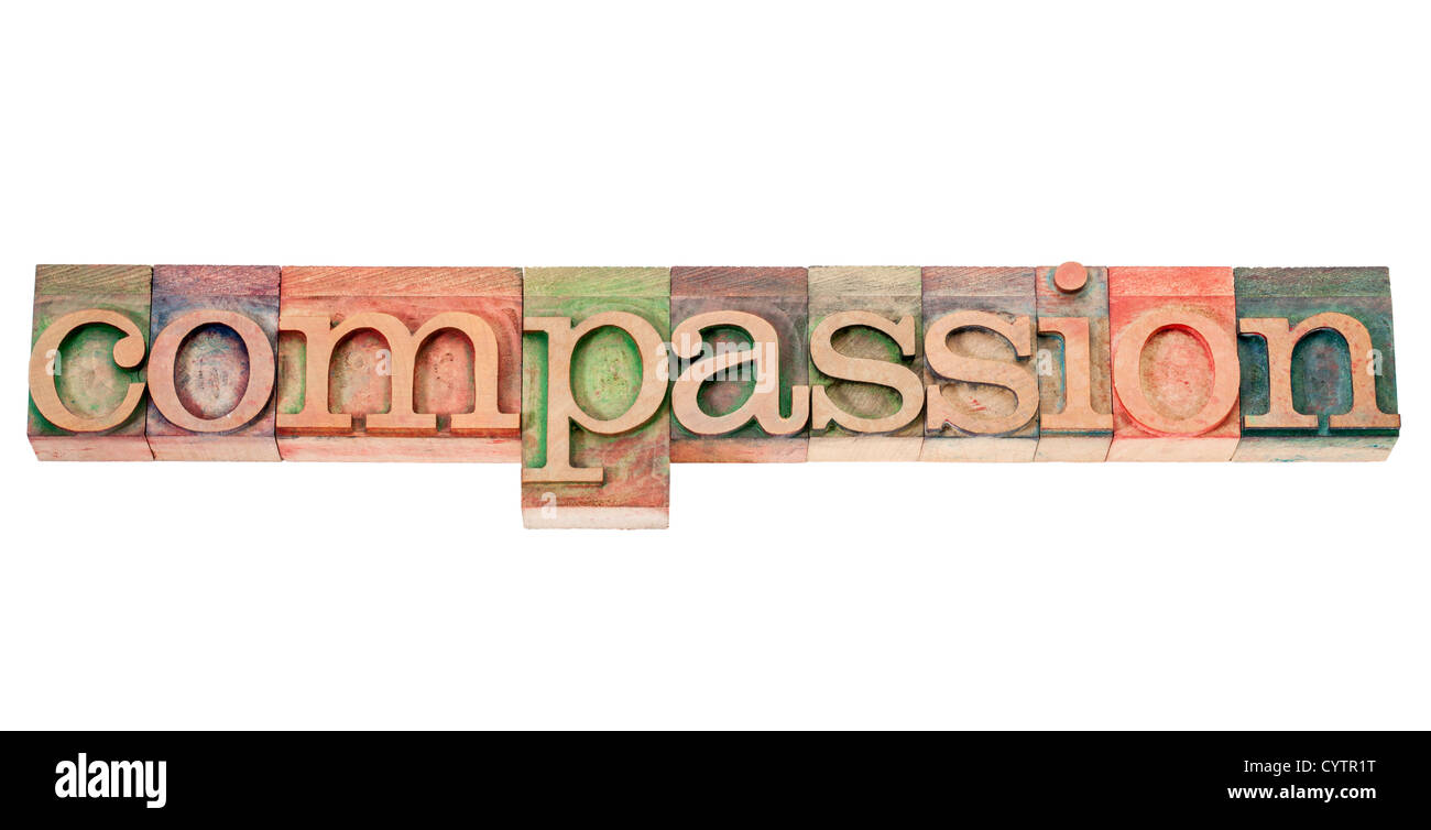 La compassione - parola isolata in rilievografia vintage tipo di legno colorati da inchiostri a colori Foto Stock