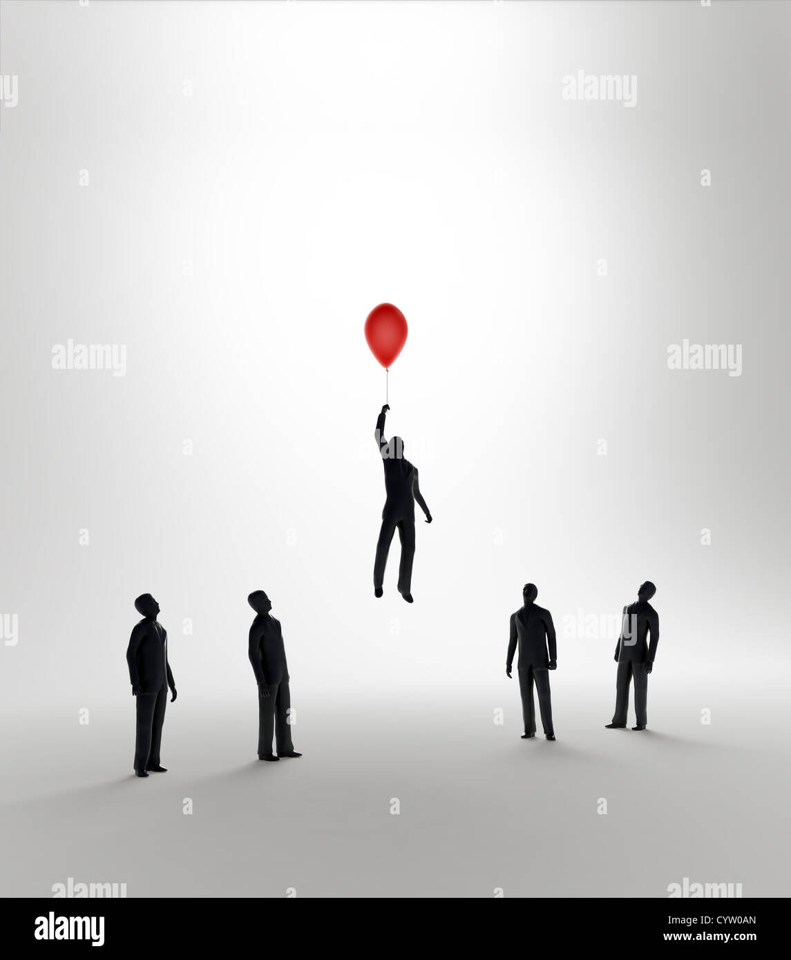 Piccolo uomo astratto volare lontano con l aiuto di un palloncino - Innovazione e vantaggio in business Foto Stock