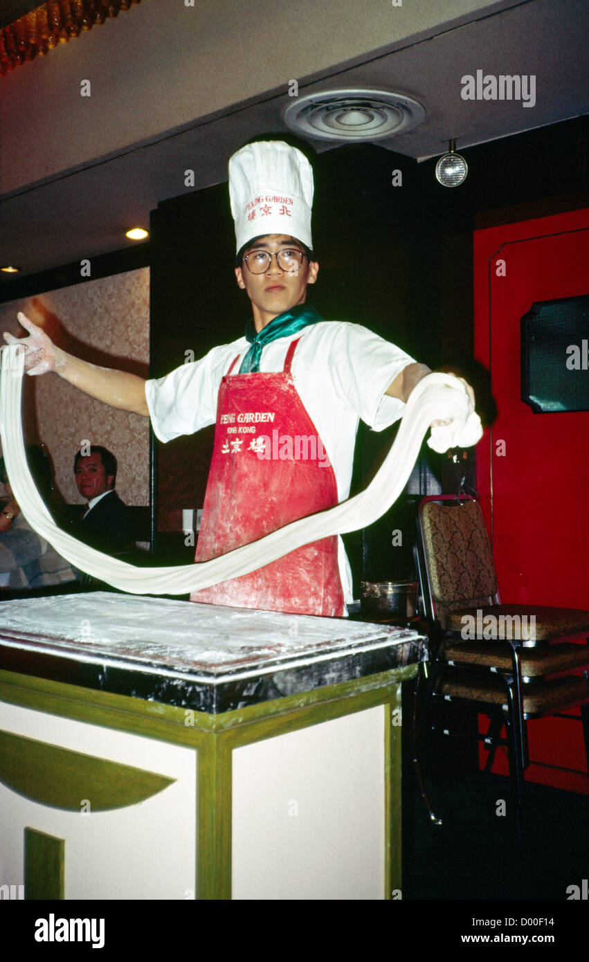 Hong Kong rendendo tagliatelle cinesi Foto Stock