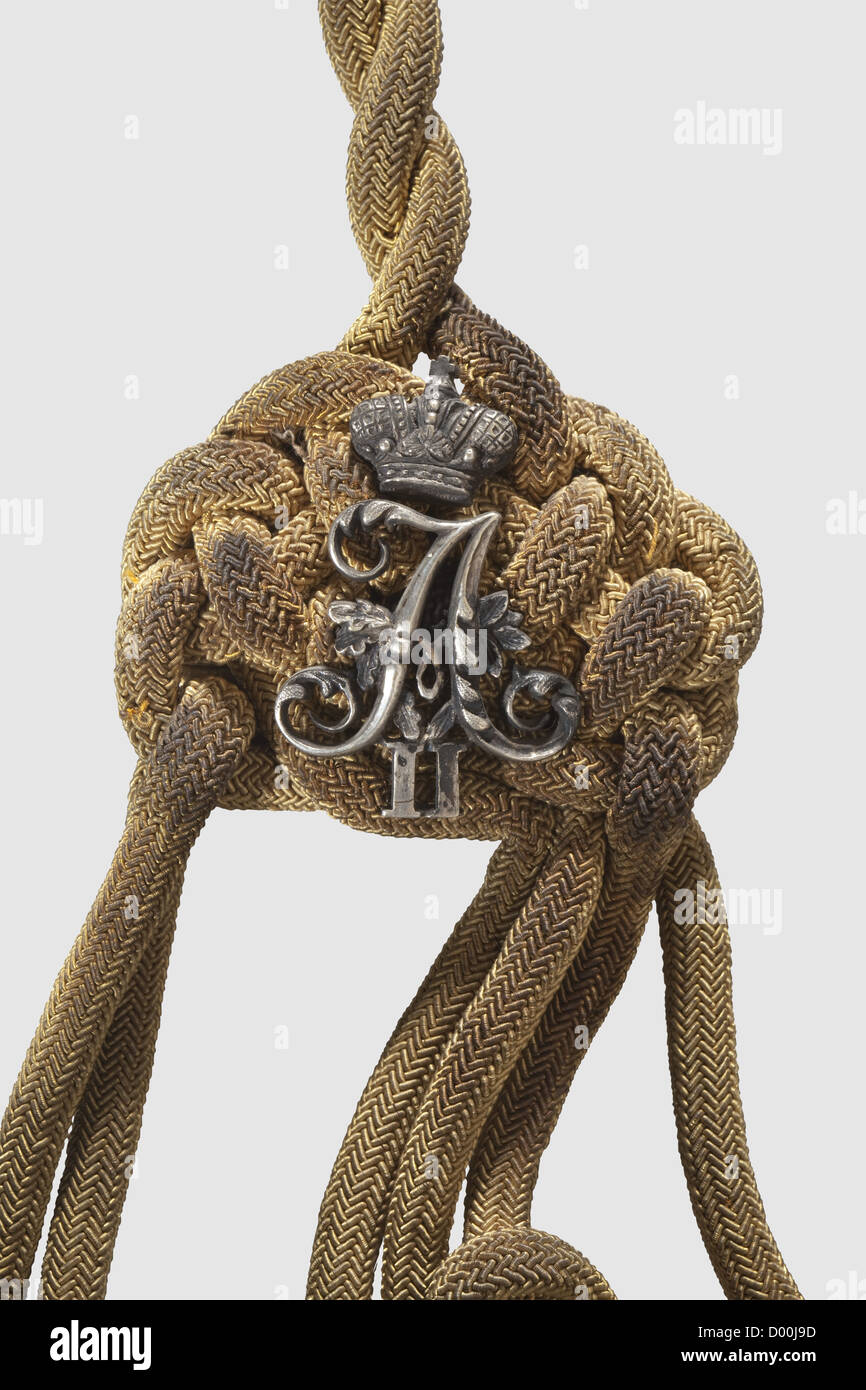 Un'aiguillette color oro per ufficiali à la suite di sua Maestà Imperiale, Russia, circa 1870. Accessori dorati con numero di cifre 'A II' e grande numero di cifre 'A II' in argento per Tsar Alexander II In buone condizioni. Raro, storico, storico, XIX secolo, gioielli, gioielli, oggetti, oggetti, fermi, ritagli, ritagli, ritagliati, ritagliati, ritagli, diritti aggiuntivi-non disponibili Foto Stock