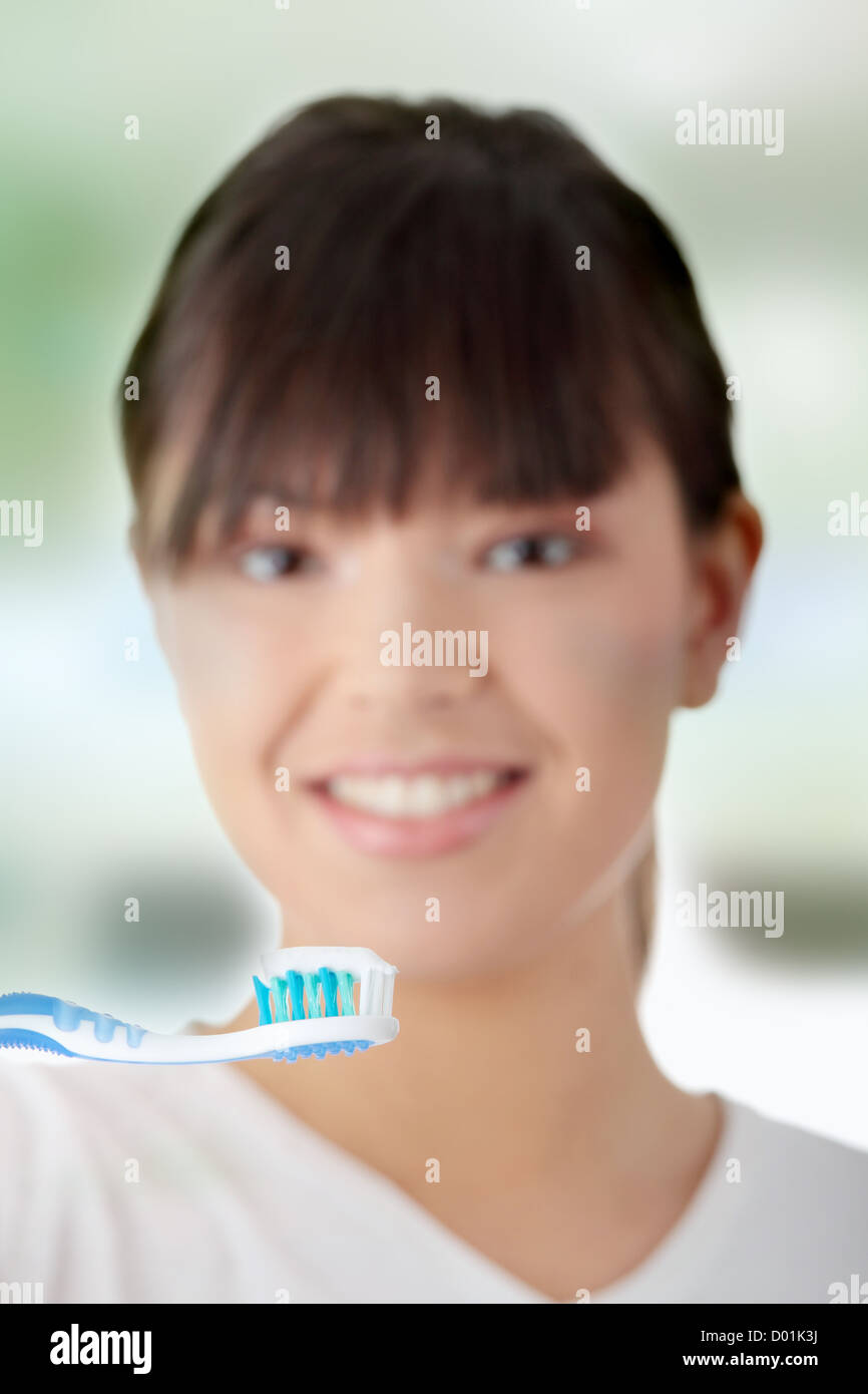 Lavare i suoi denti Foto Stock