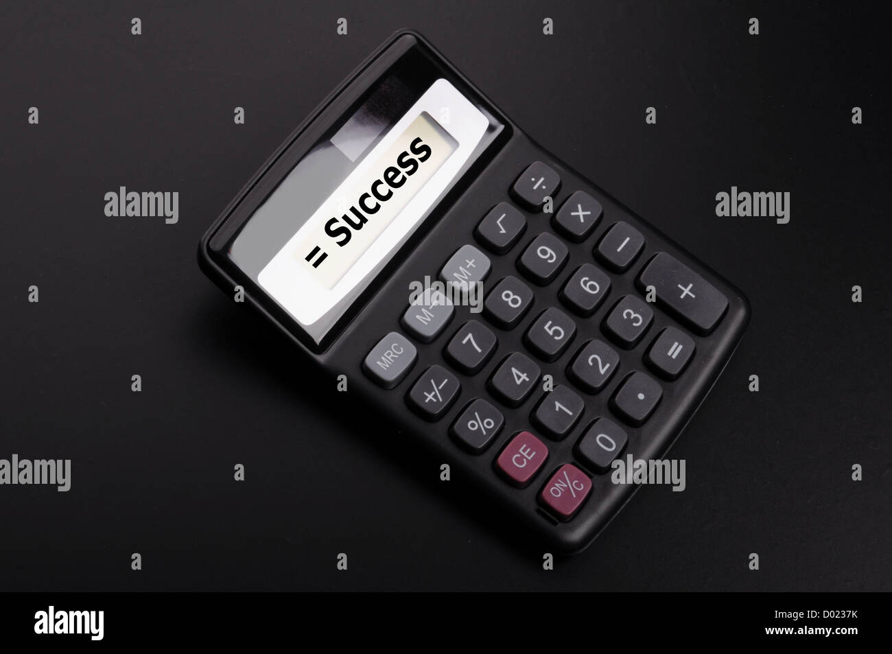Concetto di successo con la parola sul business calculator Foto Stock
