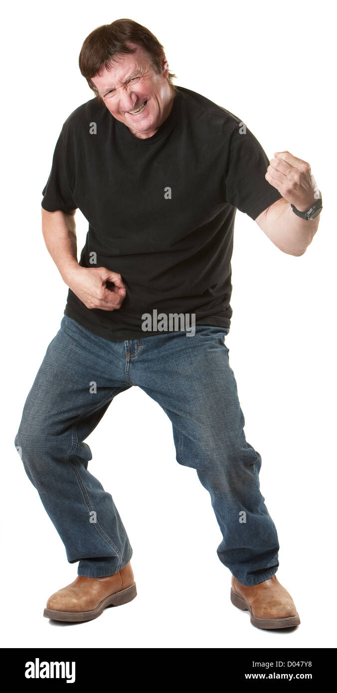 Matura energico uomo caucasico gesti a suonare la chitarra Foto Stock