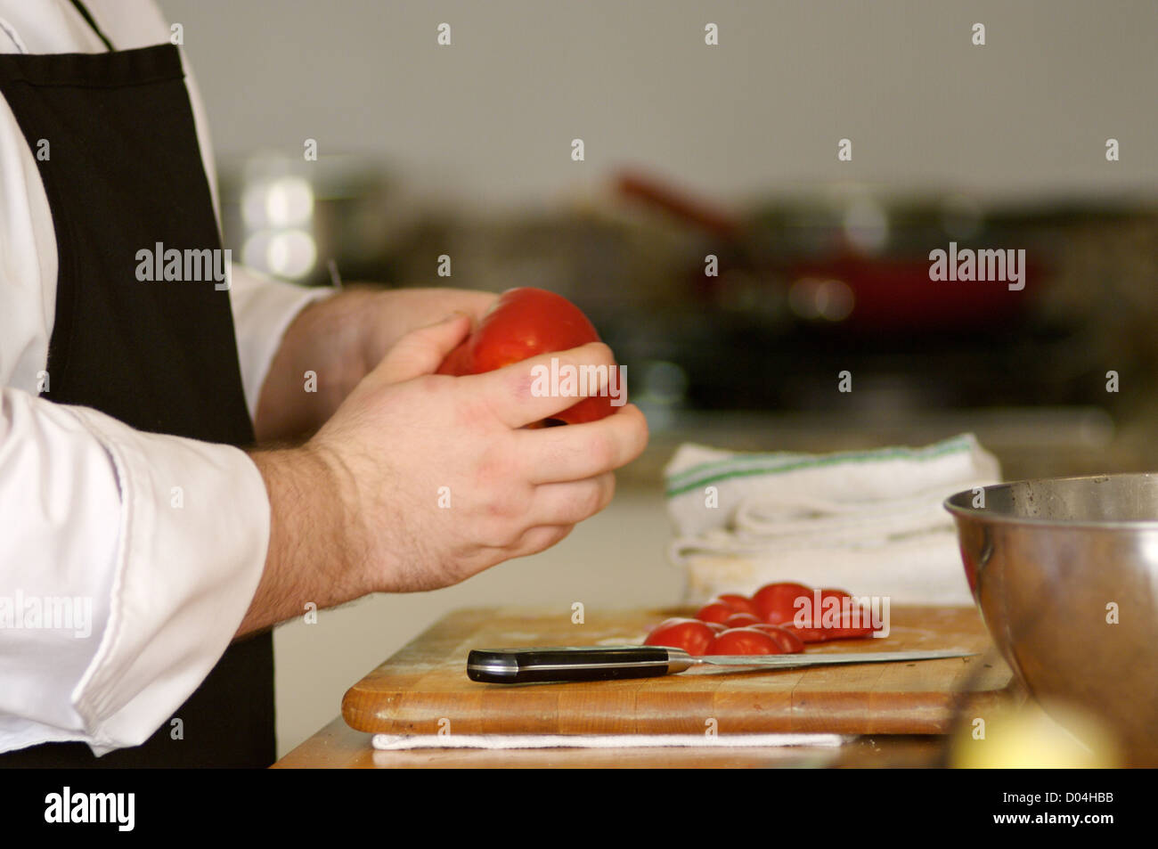 Mano di cibo di trinciatura Foto Stock