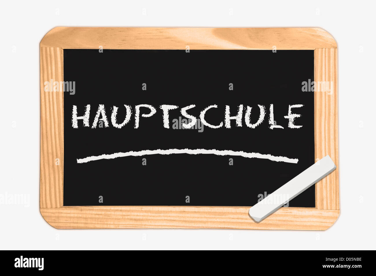 Dettaglio foto di una lavagna con il tedesco iscrizione scuola generale, bianco gesso si trova in un angolo Foto Stock