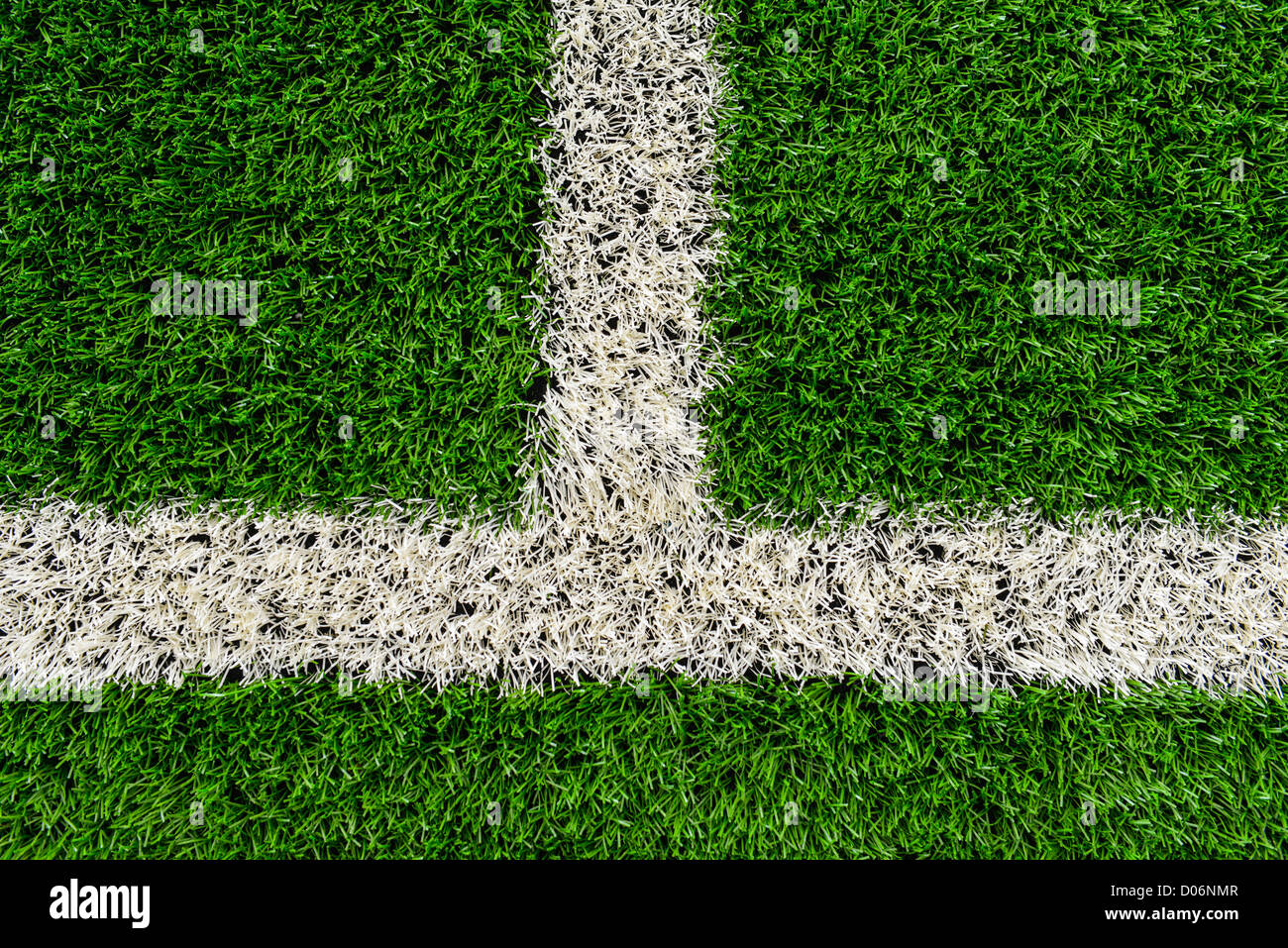La linea di contatto su di un campo da calcio fatto di terza generazione astro turf. Foto Stock