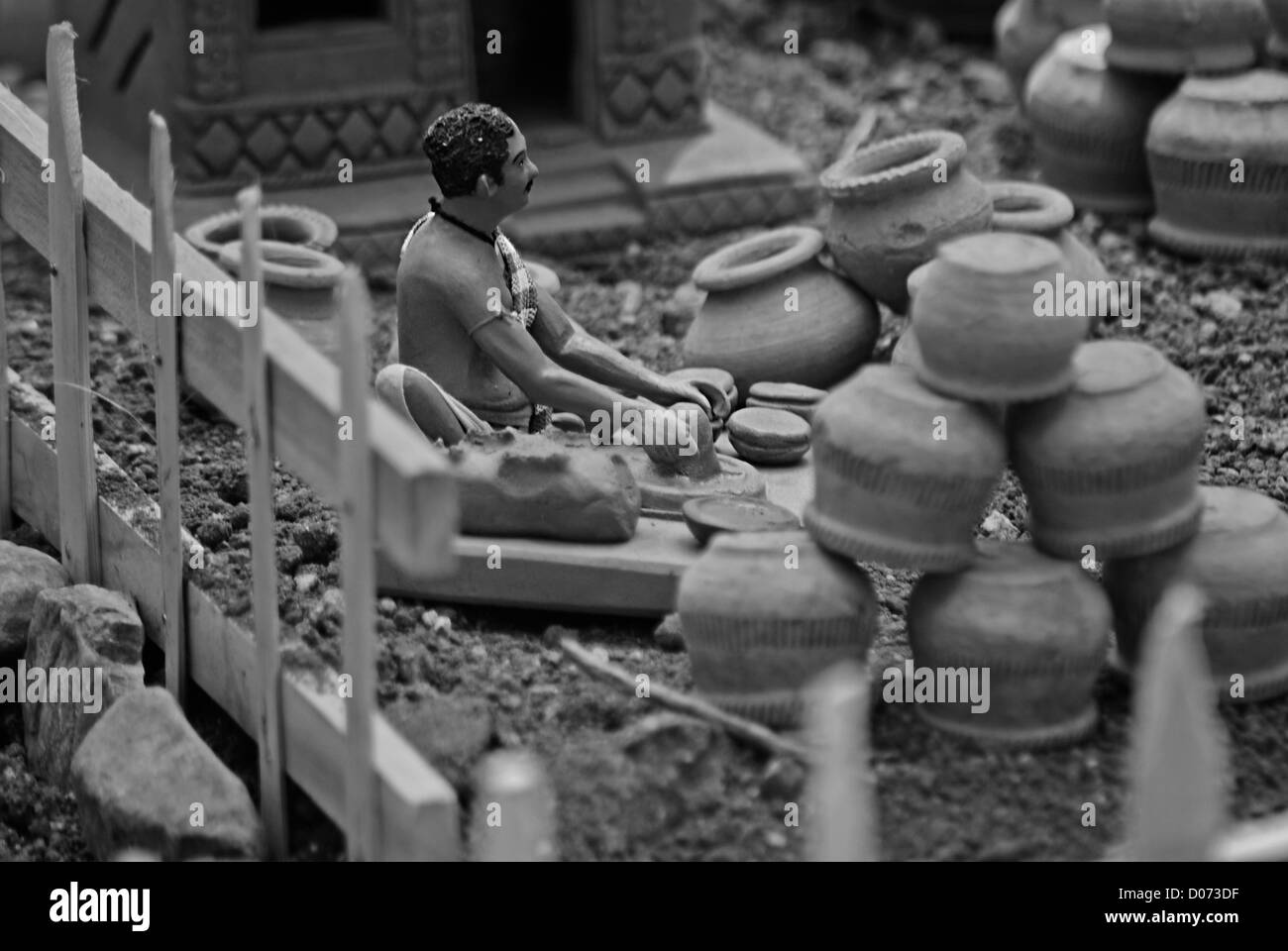 Statua in miniatura di un vasaio, lavoratore Foto Stock