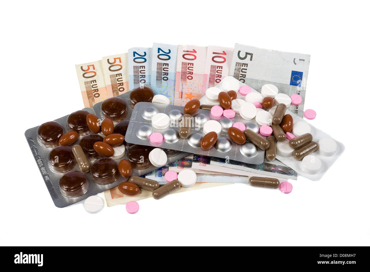 Medicine e pillole su euro carta moneta Foto Stock
