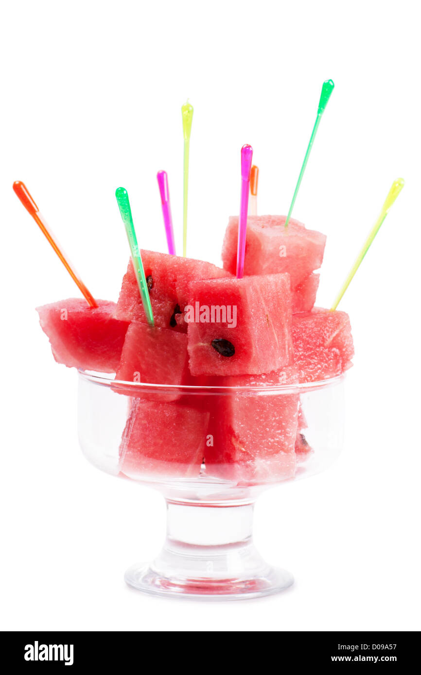 Vista macro di anguria fresca pezzi in una ciotola di vetro Foto Stock