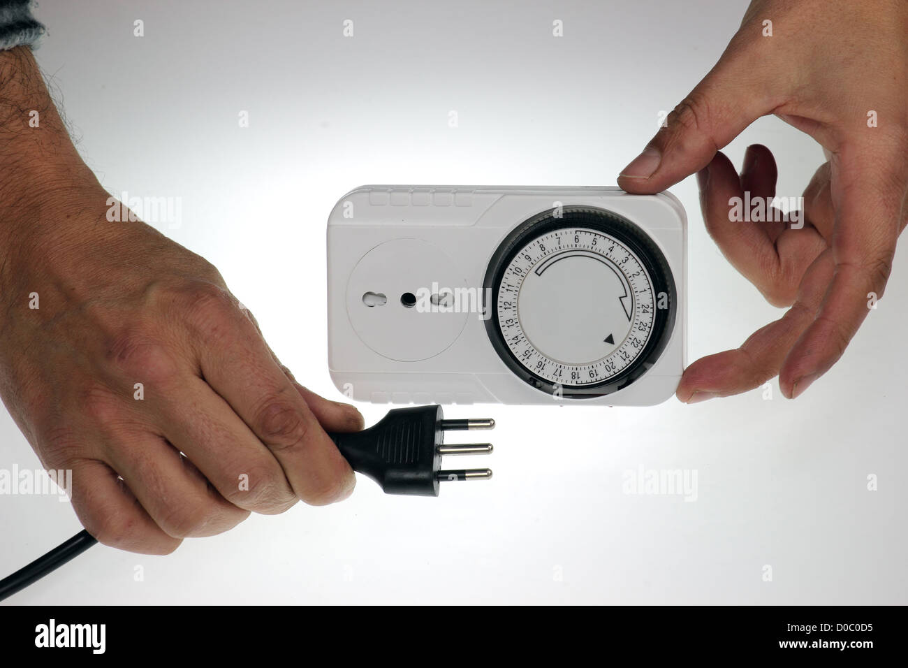 Tempo di presa di clock con spina europea Foto Stock
