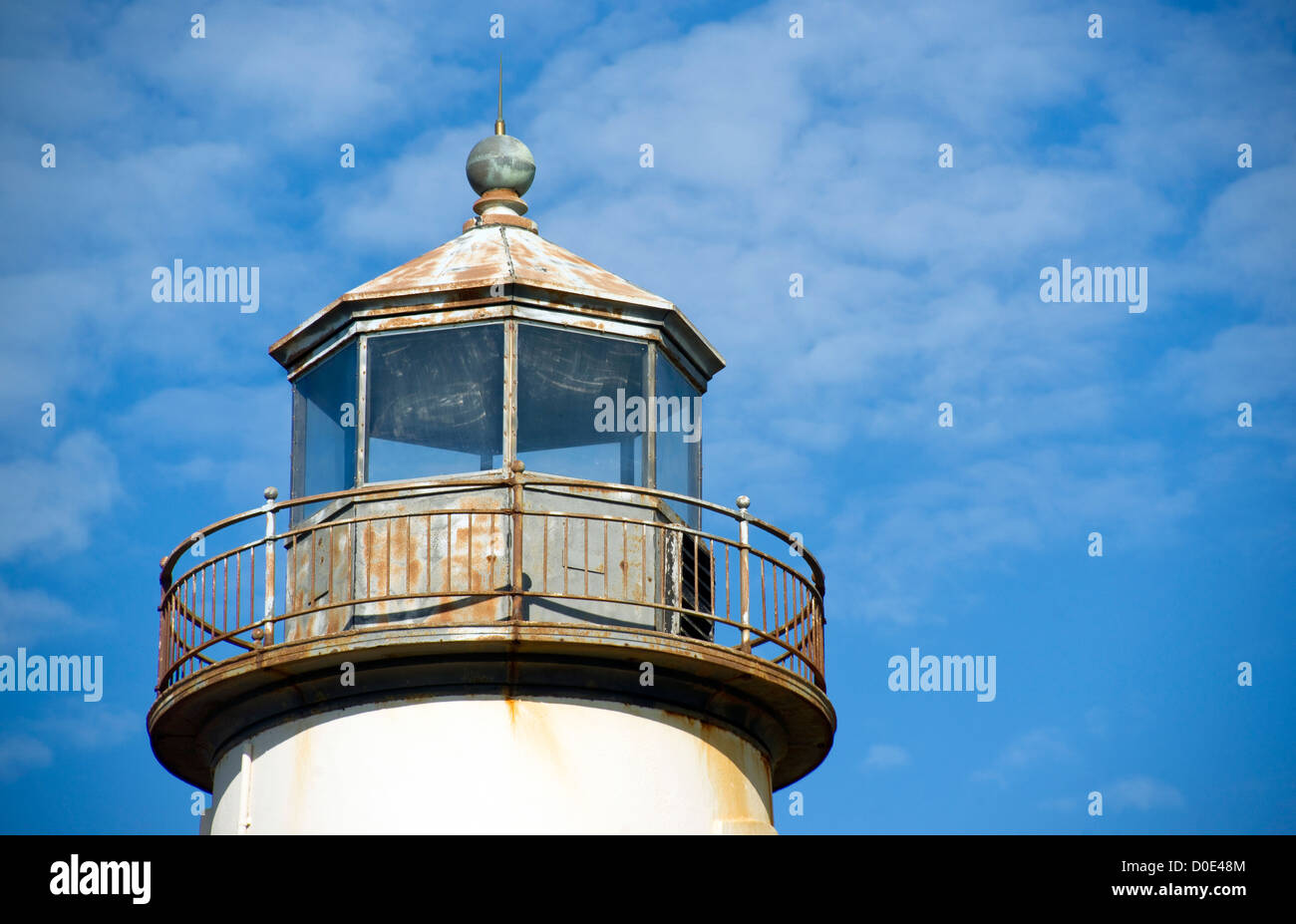 La parte superiore alloggiamento della lente su una costa Ovest faro Foto Stock