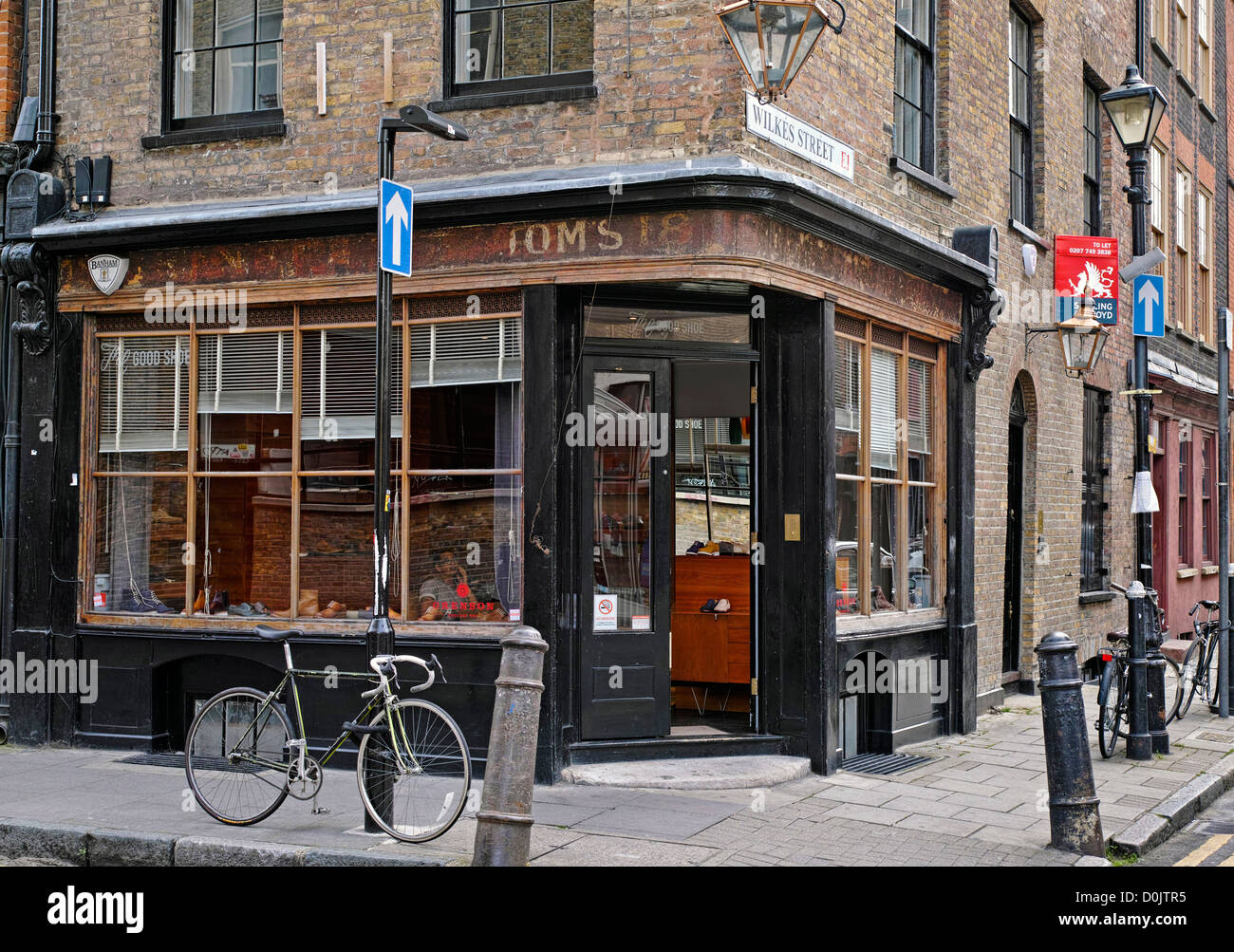 Il buon deposito di pattino all'angolo di Hanbury Street e documento Wilkes Street. Foto Stock