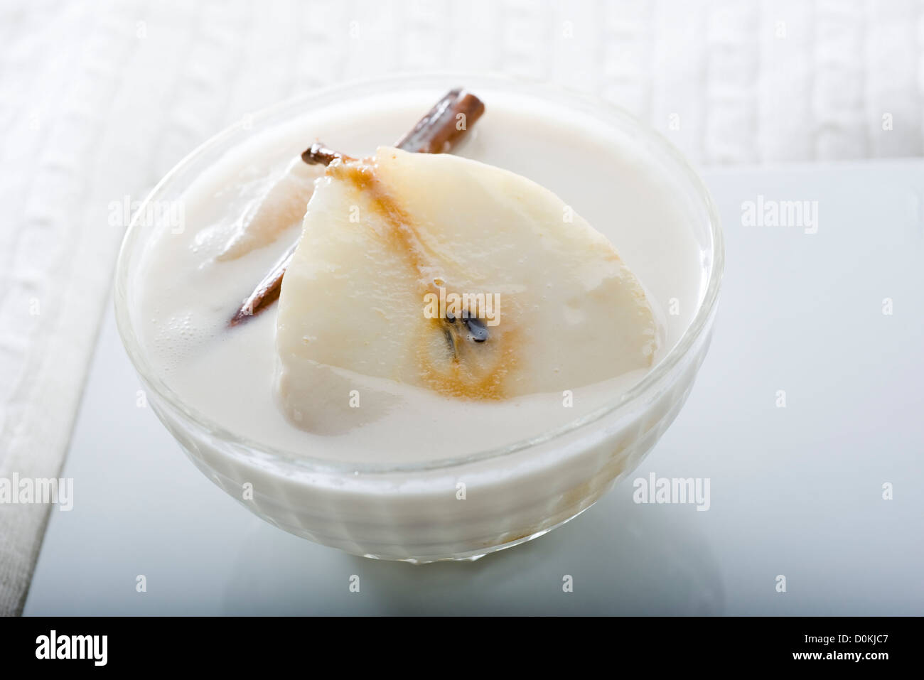 Pere cotto in latte di cocco Foto Stock
